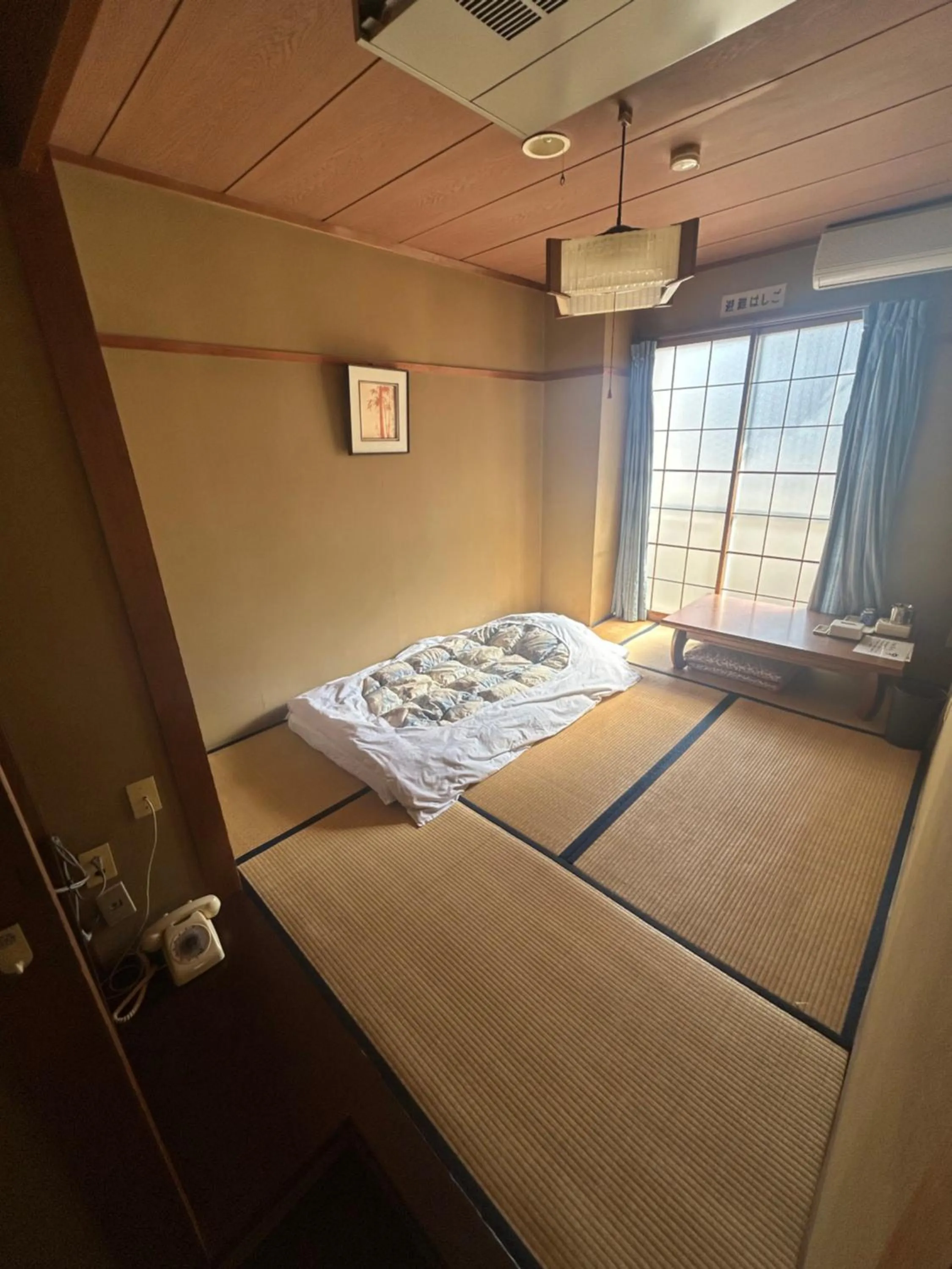 Bed in Business Hotel Nakayama