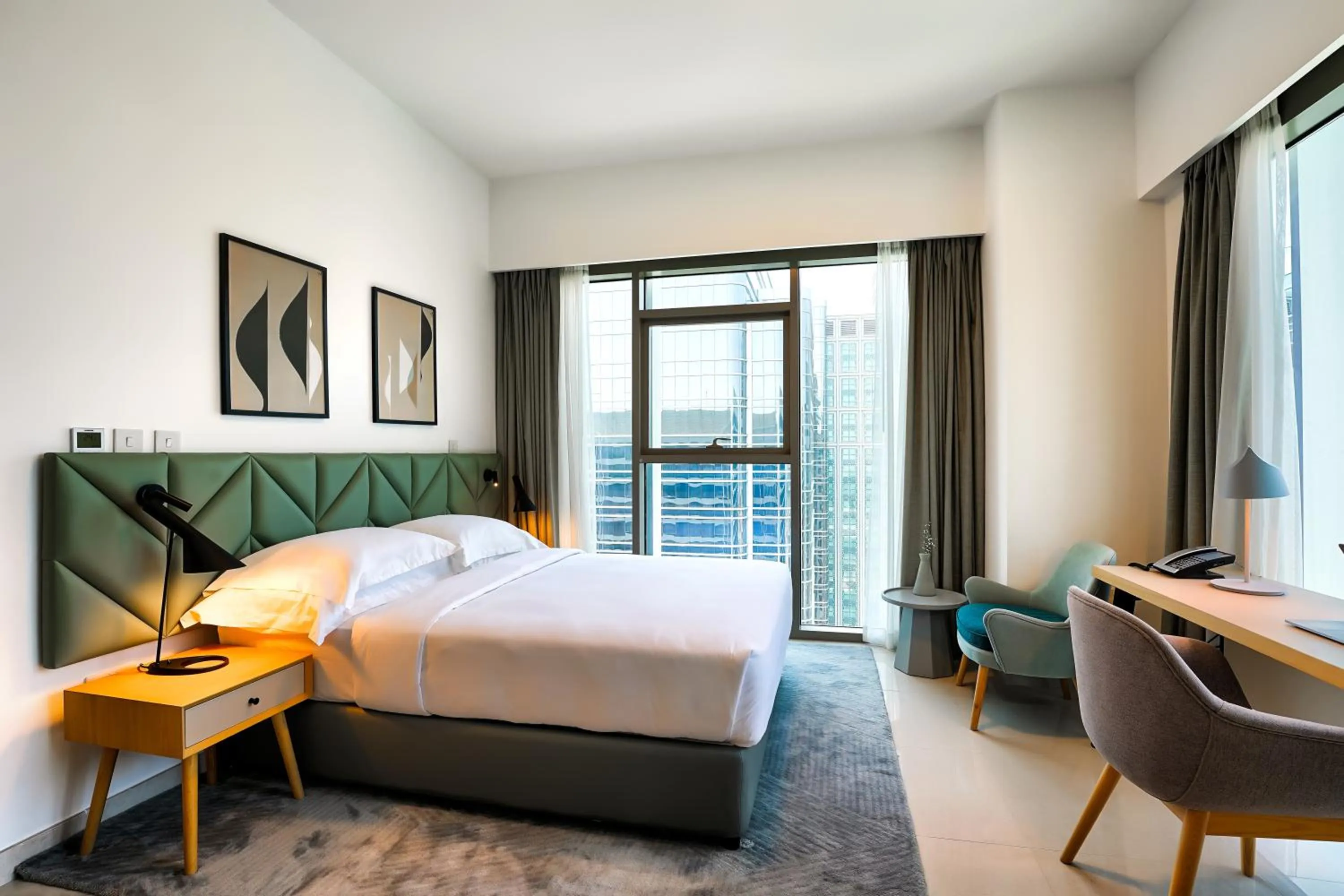 Bed in Capital Suites Hotel Apartments