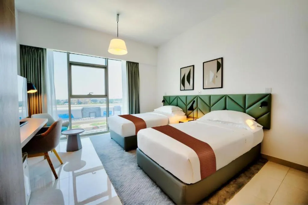 Bed in Capital Suites Hotel Apartments