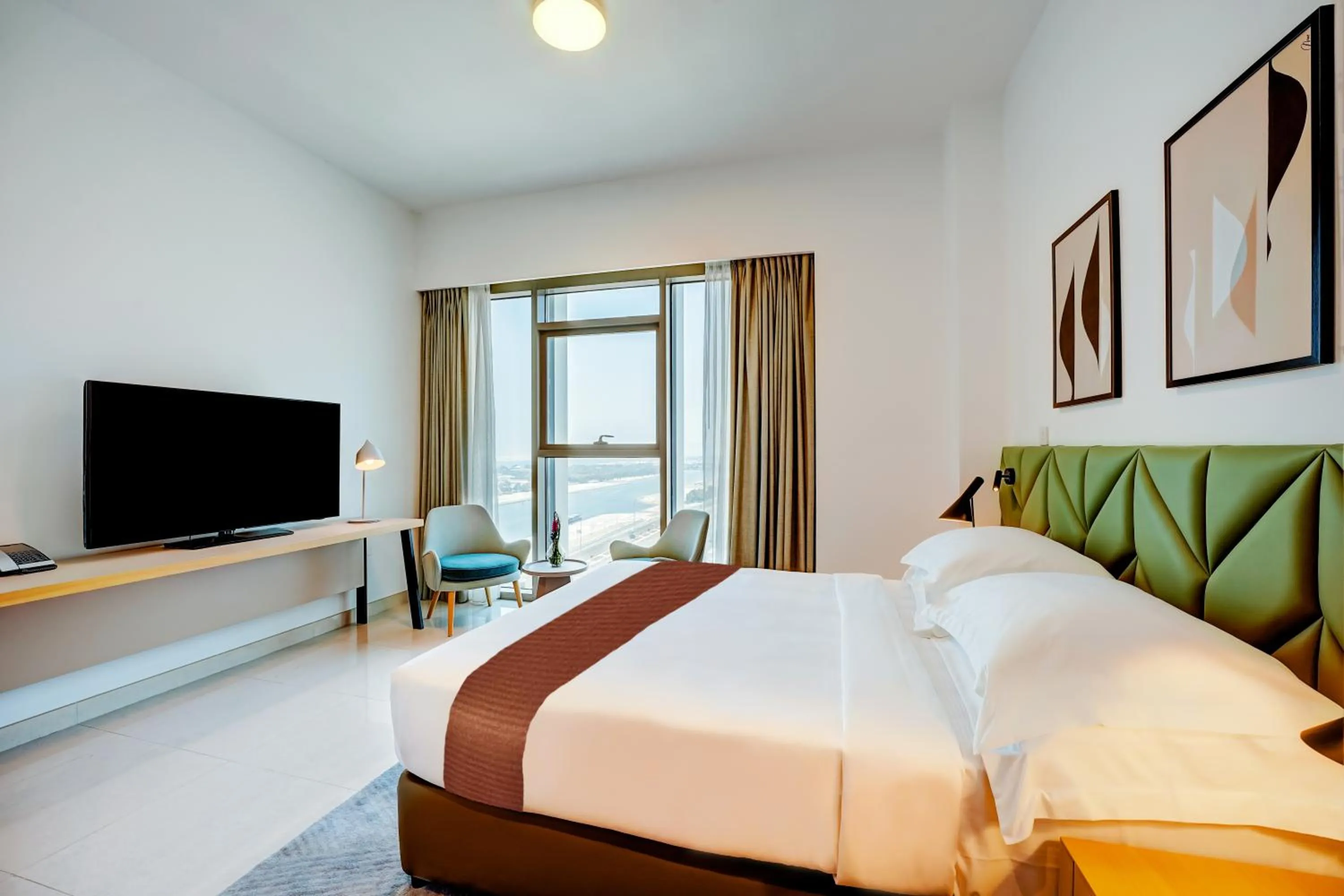 Bed in Capital Suites Hotel Apartments