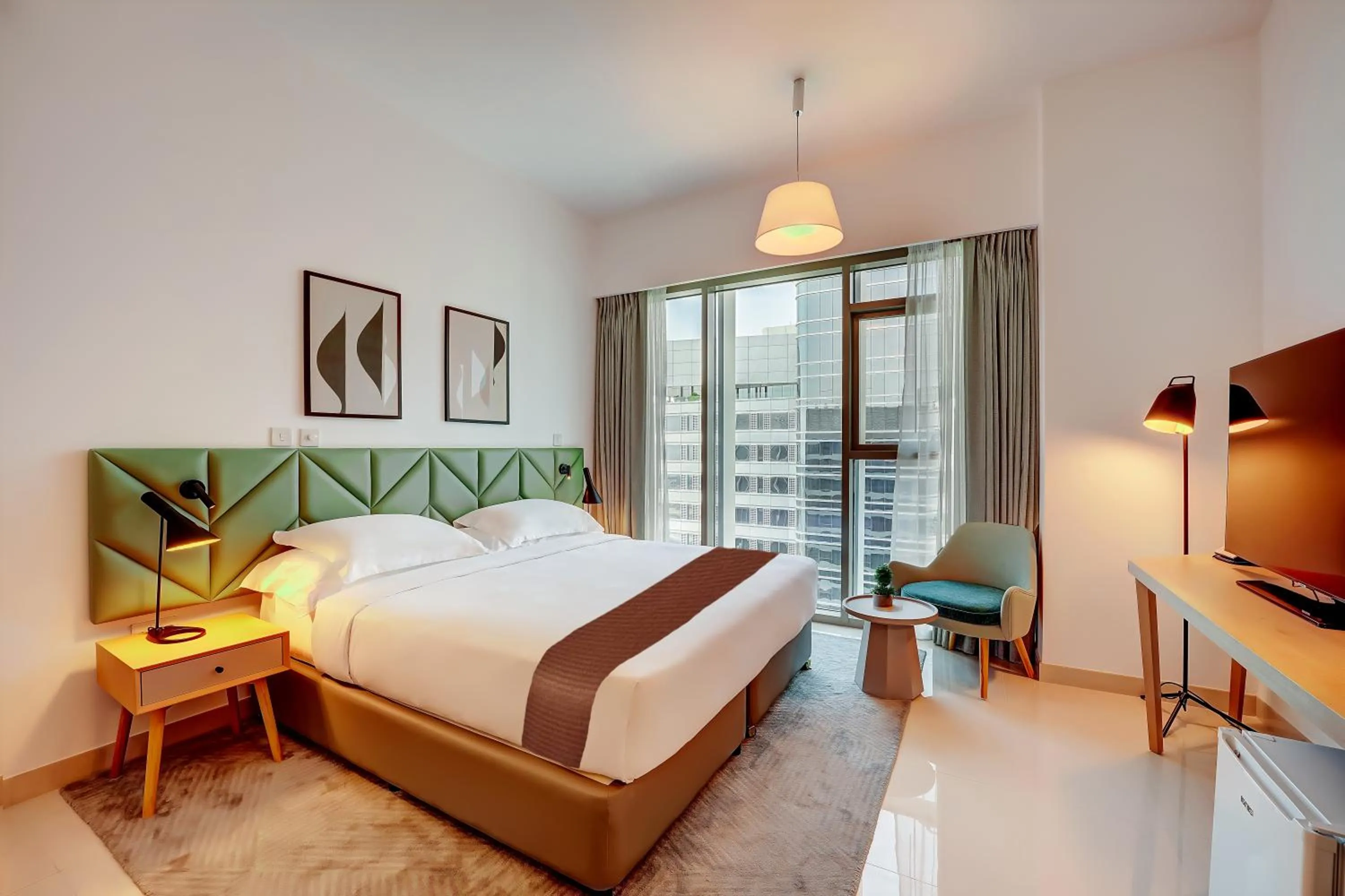 Bed in Capital Suites Hotel Apartments