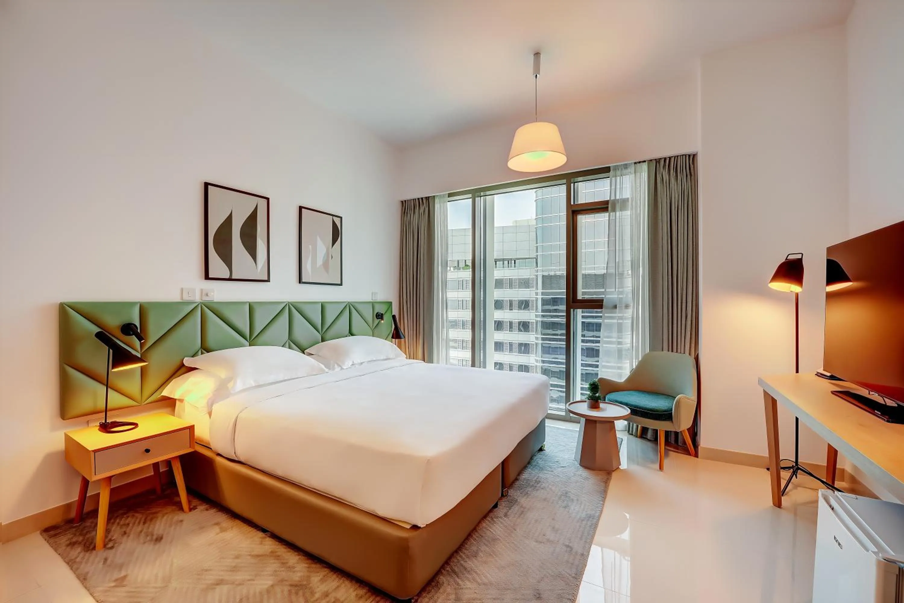 Bed in Capital Suites Hotel Apartments