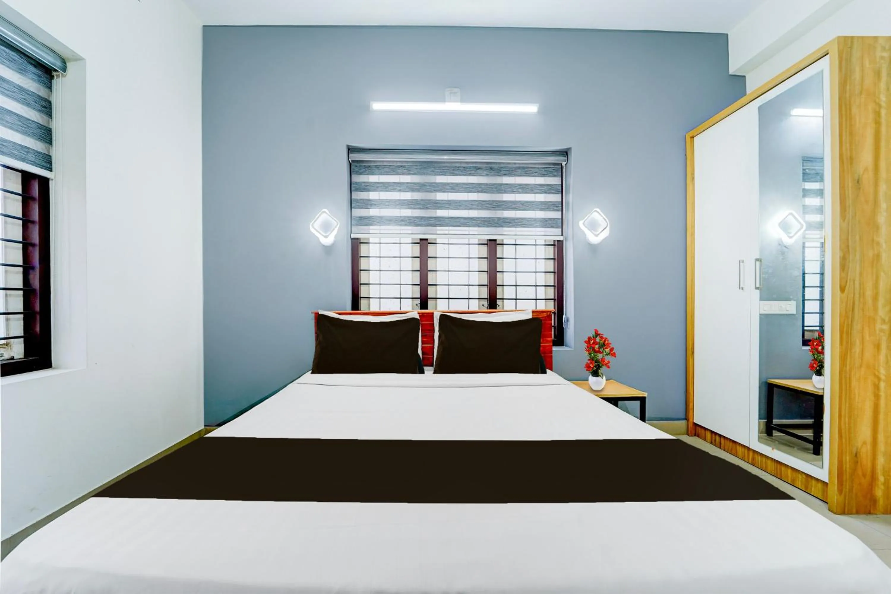 Bedroom, Bed in Super Hotel O Kazhakootam Near Technopark Phase 2