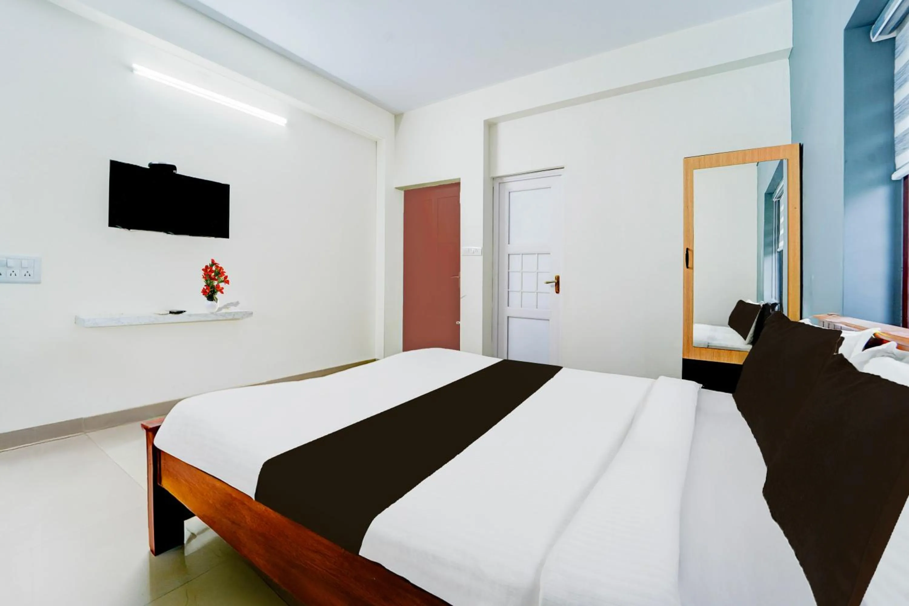 Bedroom, Bed in Super Hotel O Kazhakootam Near Technopark Phase 2