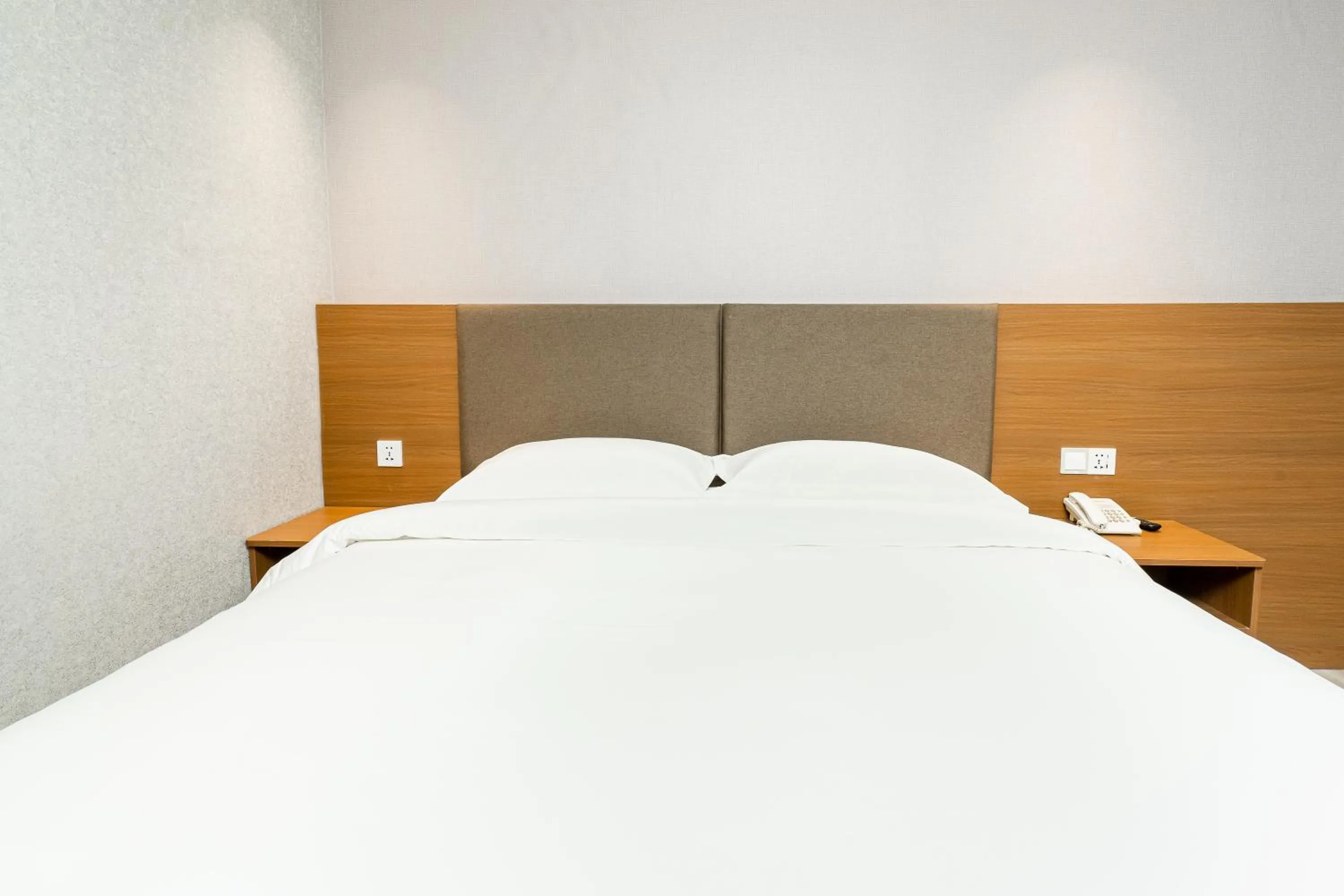 Bed in Aurea Delight Hotel