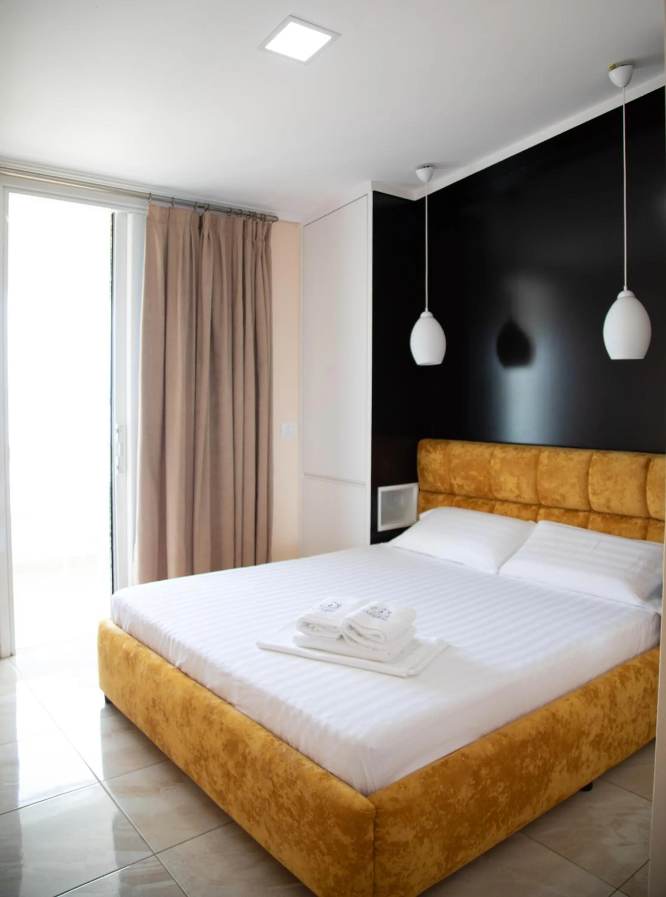 Bed in Vila e Bardhe Butique Hotel