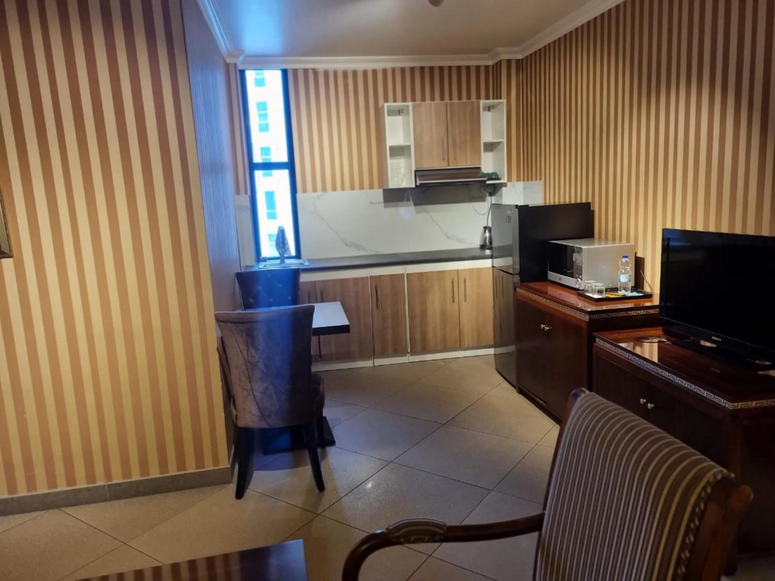 Kitchen or kitchenette in The Residence Hotel