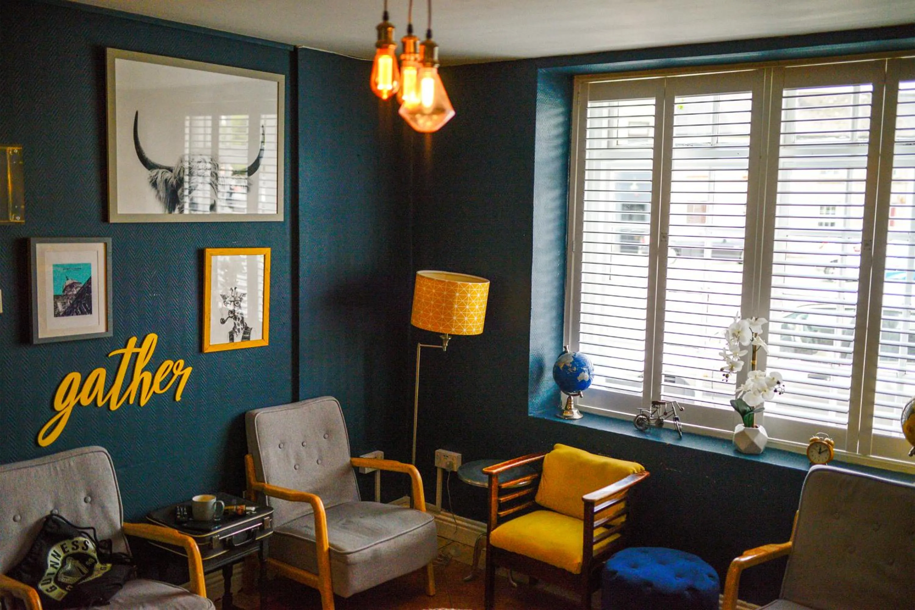 Communal lounge/ TV room in The Woodquay Hostel