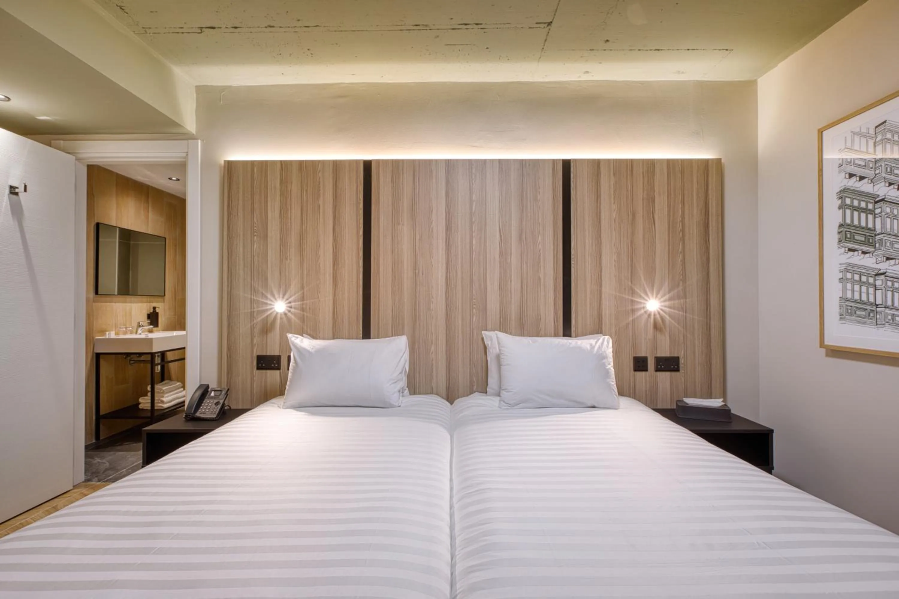 Bed in VITA Hotel & Rooftop