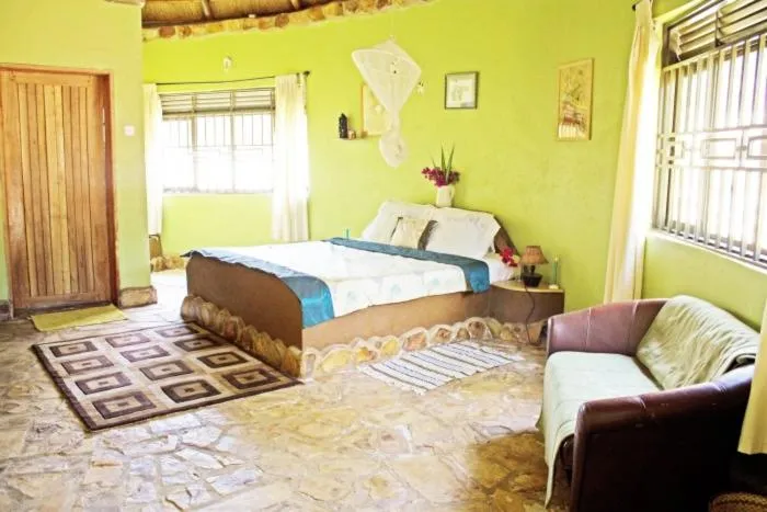 Living room, Bed in Nyore Hillside Retreat