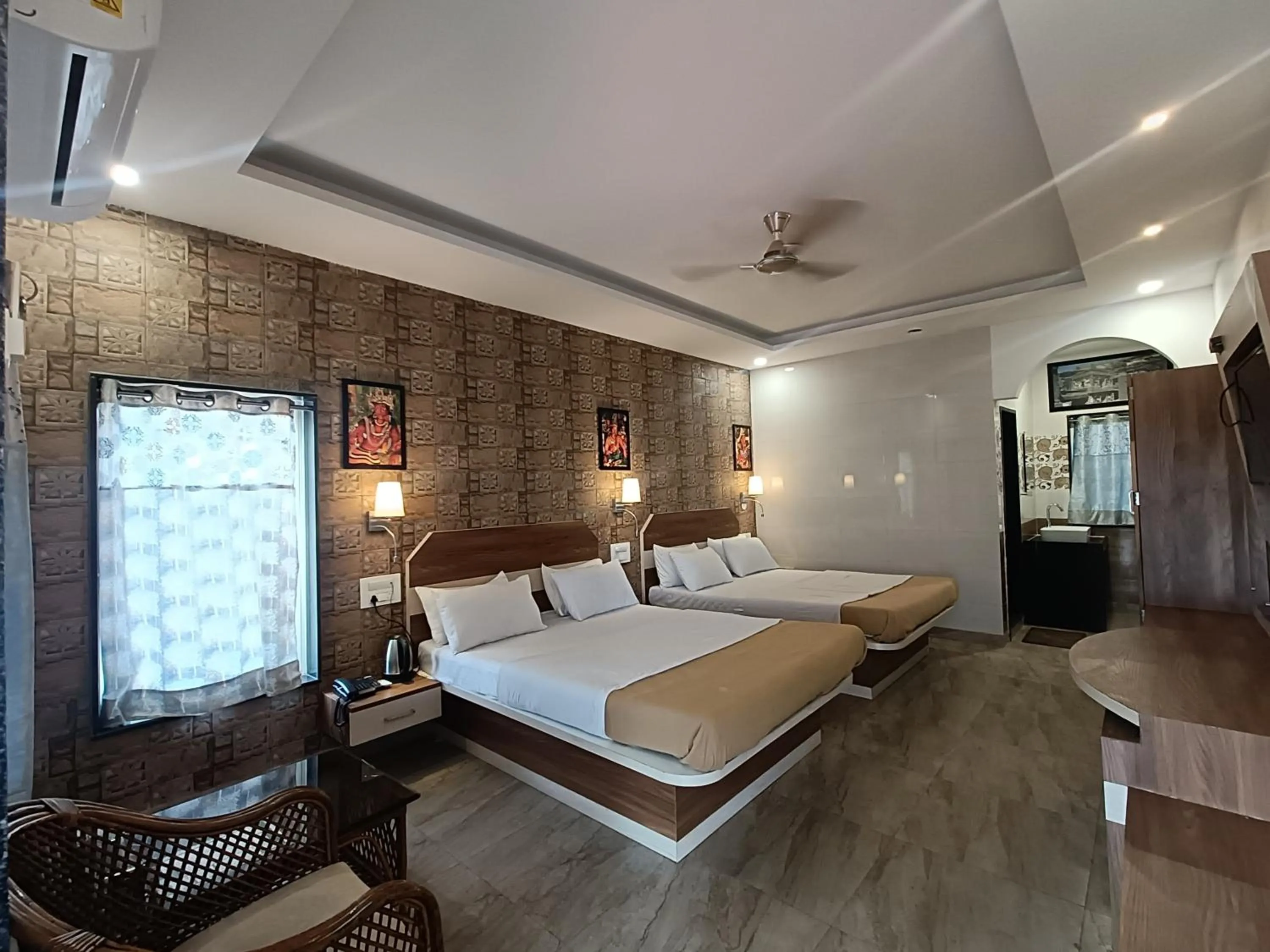 Bed in Ellora Heritage Resort