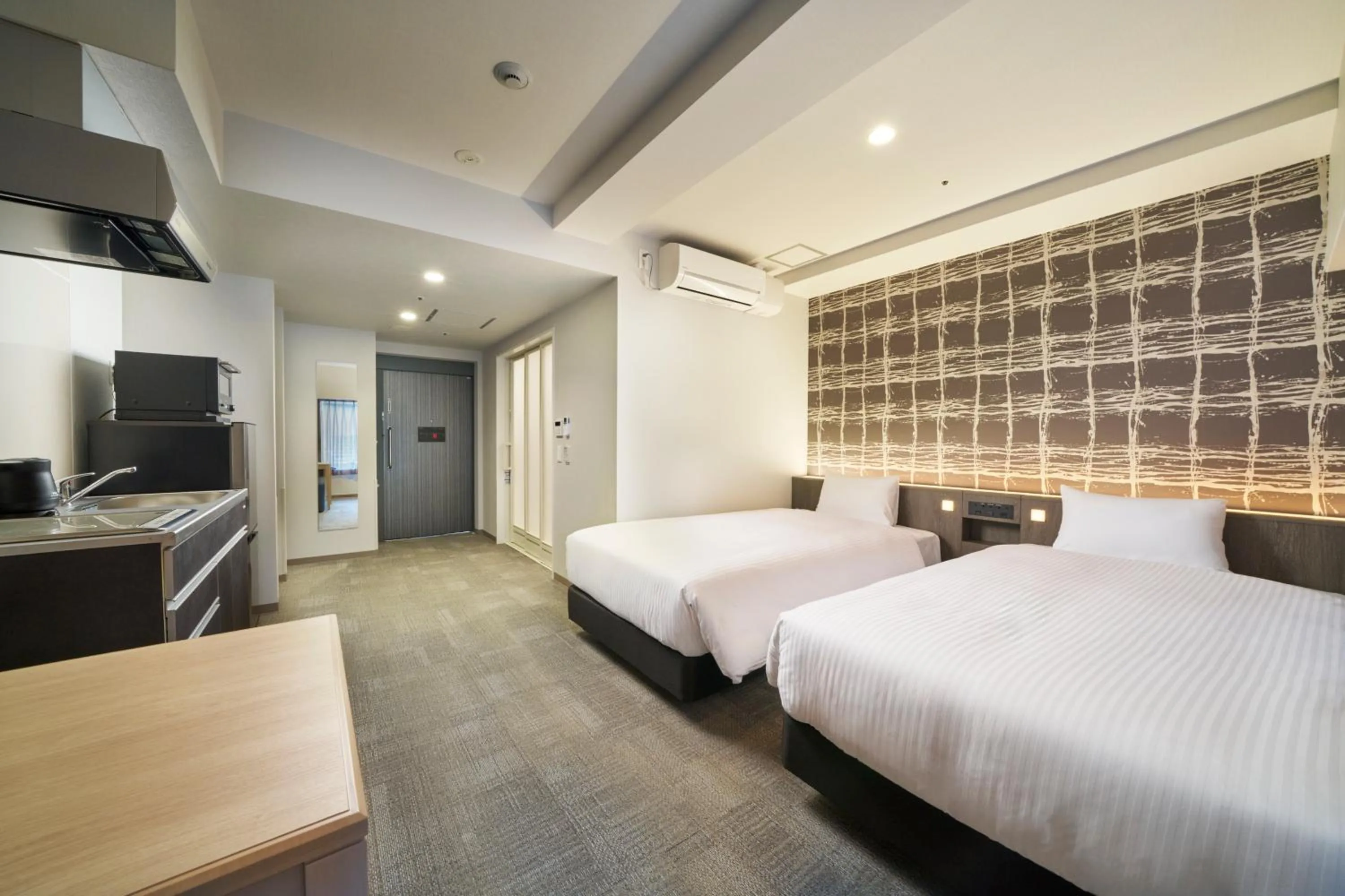 Kitchen or kitchenette, Bed in KOKO HOTEL Osaka Namba Sennichimae