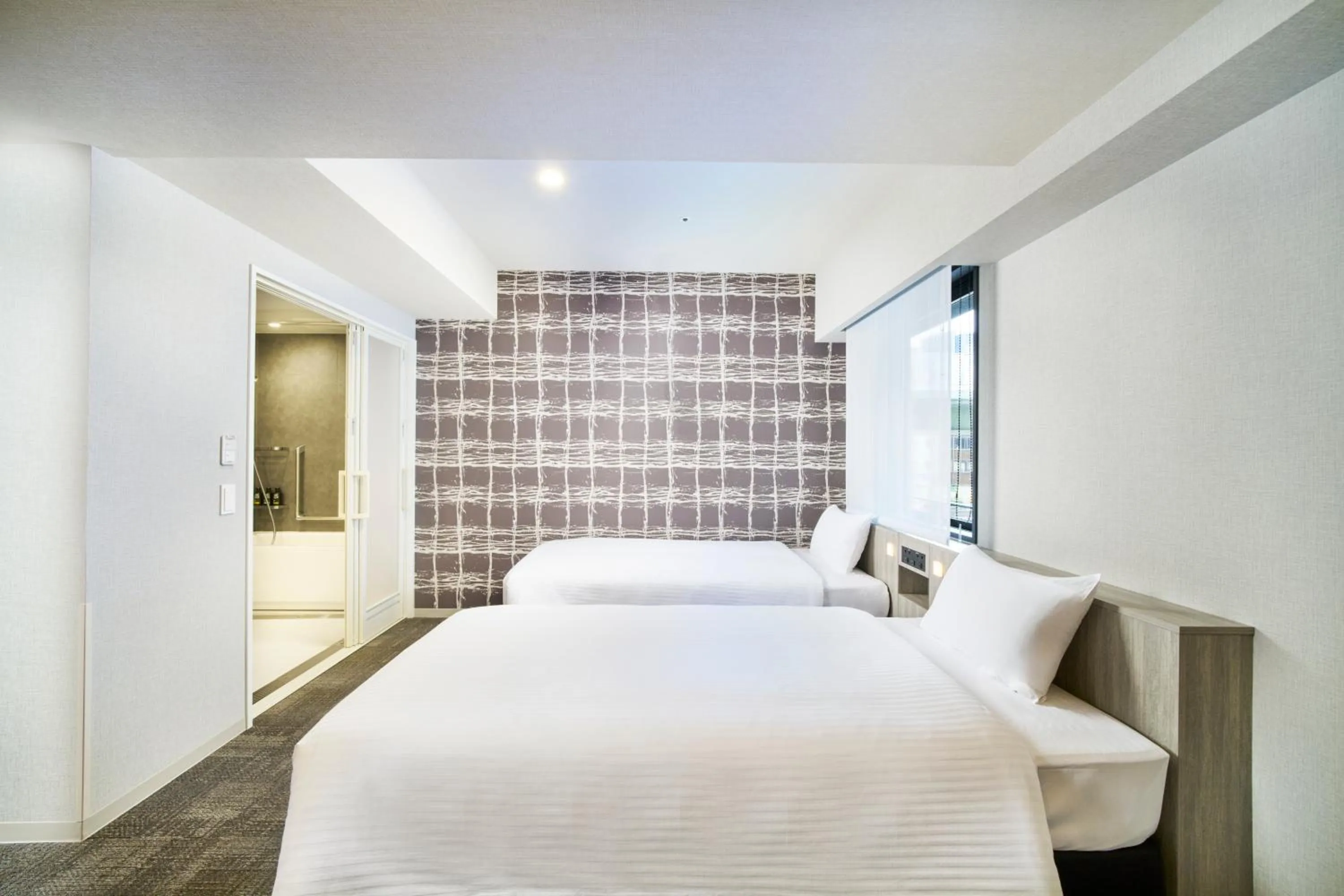 Photo of the whole room, Bed in KOKO HOTEL Osaka Namba Sennichimae