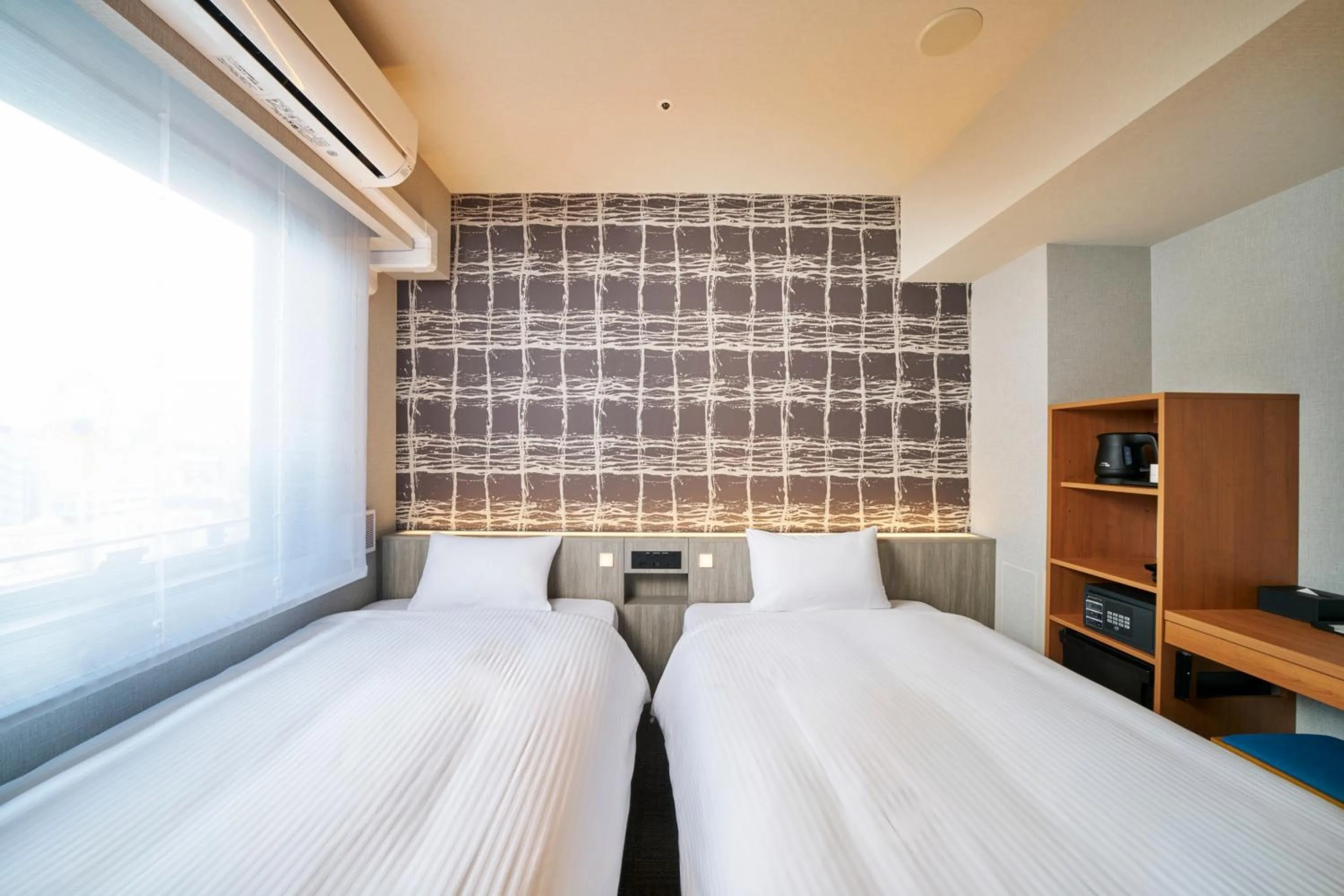 Photo of the whole room, Bed in KOKO HOTEL Osaka Namba Sennichimae