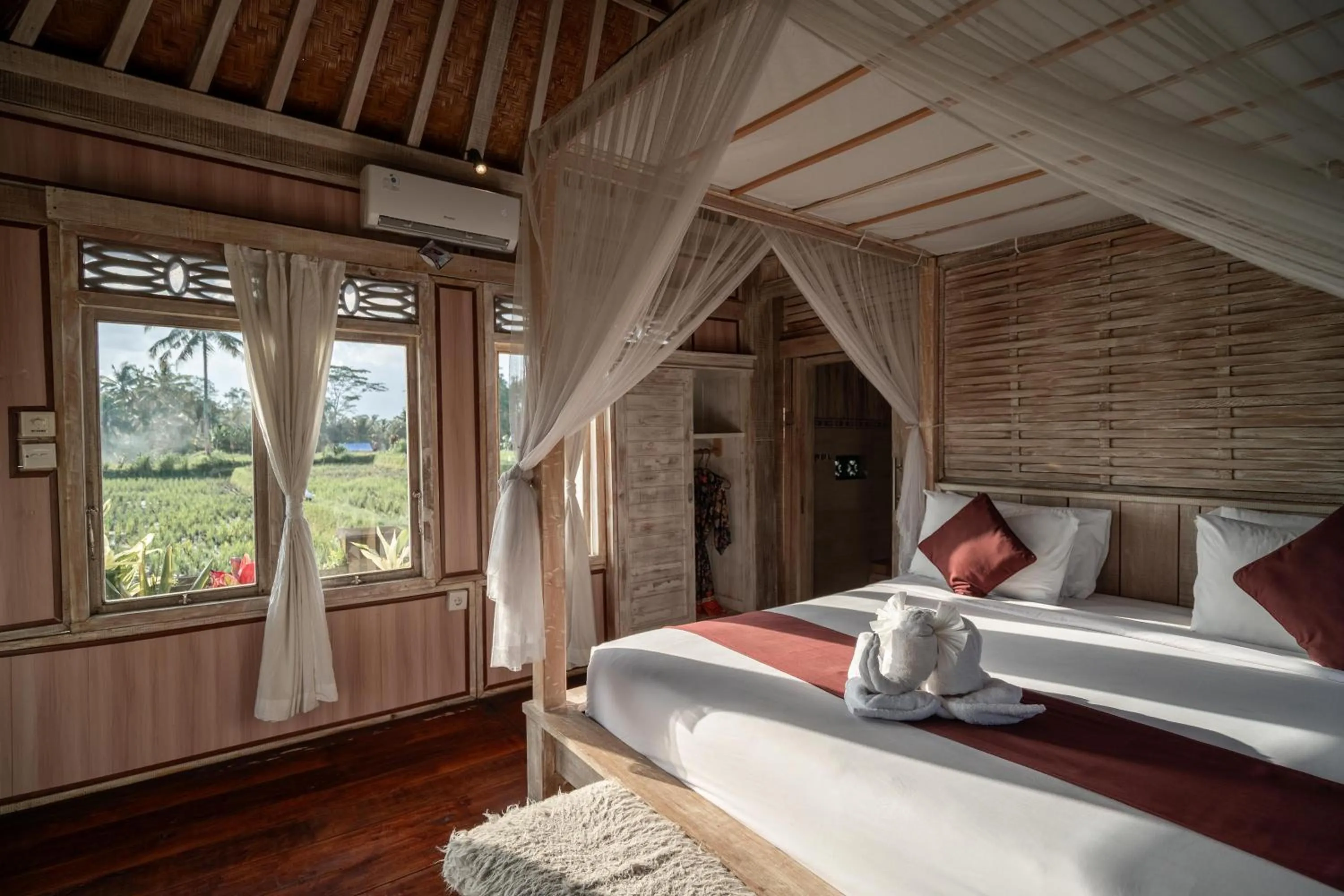 Bed in Uma Caming Villa Ubud