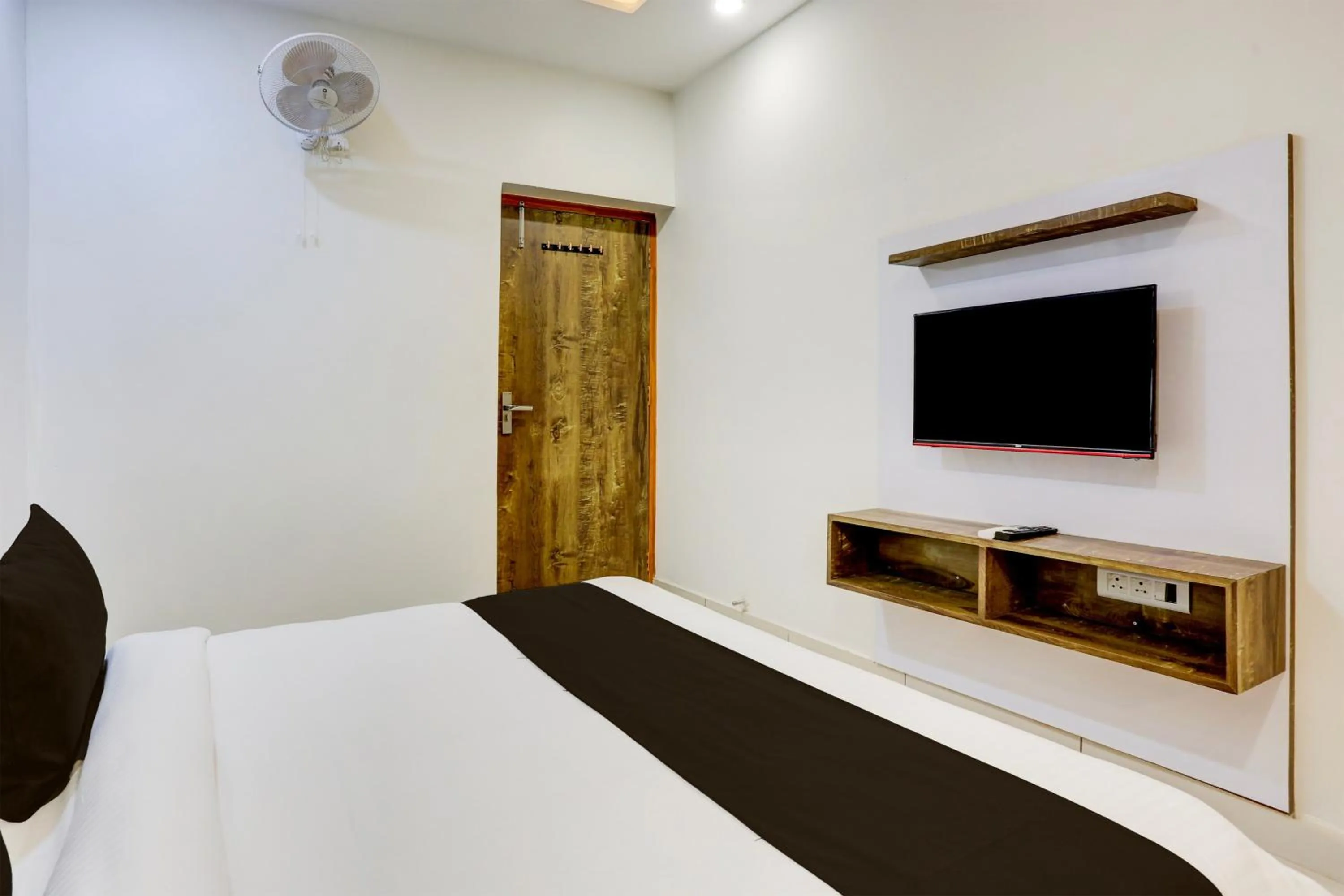 Bedroom, Bed in Super Townhouse Model Town Rohtak Formerly Hotel Tathastu