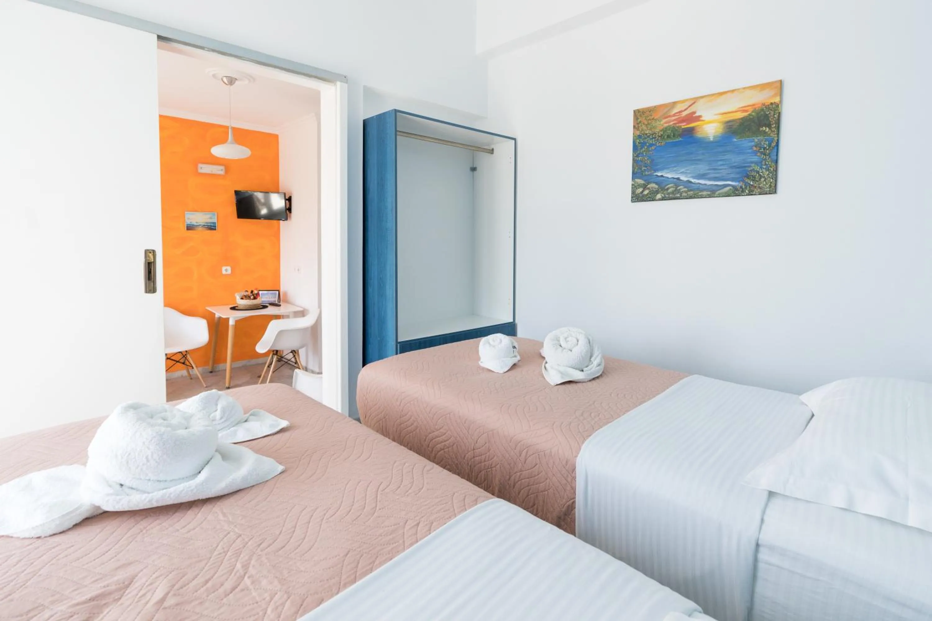 Bed in Poseidon Apartments