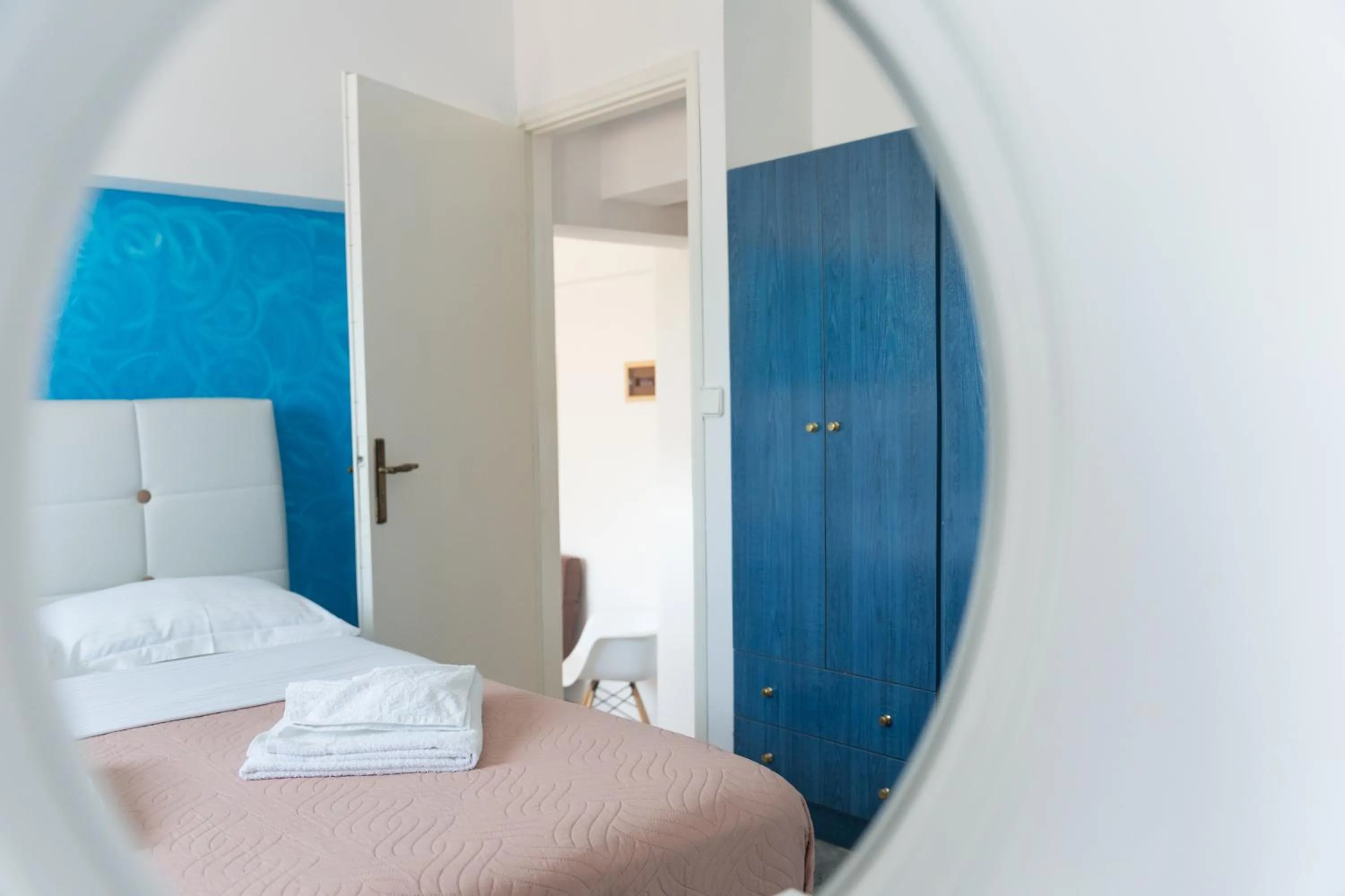 Bed in Poseidon Apartments