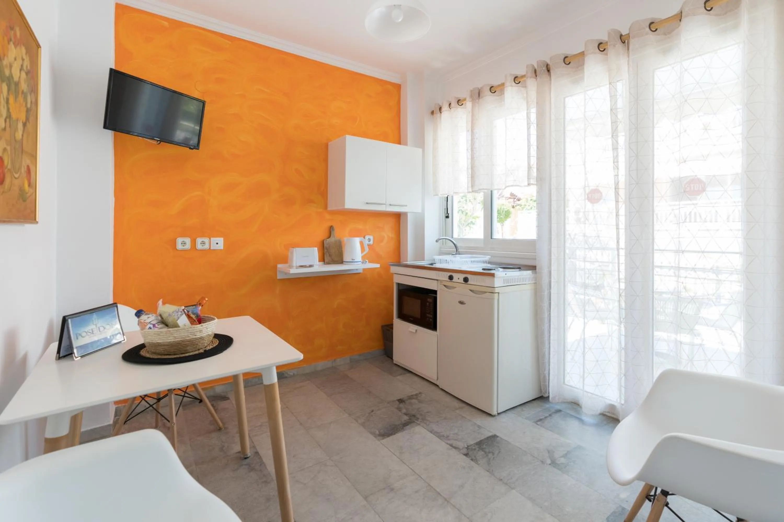 TV and multimedia in Poseidon Apartments