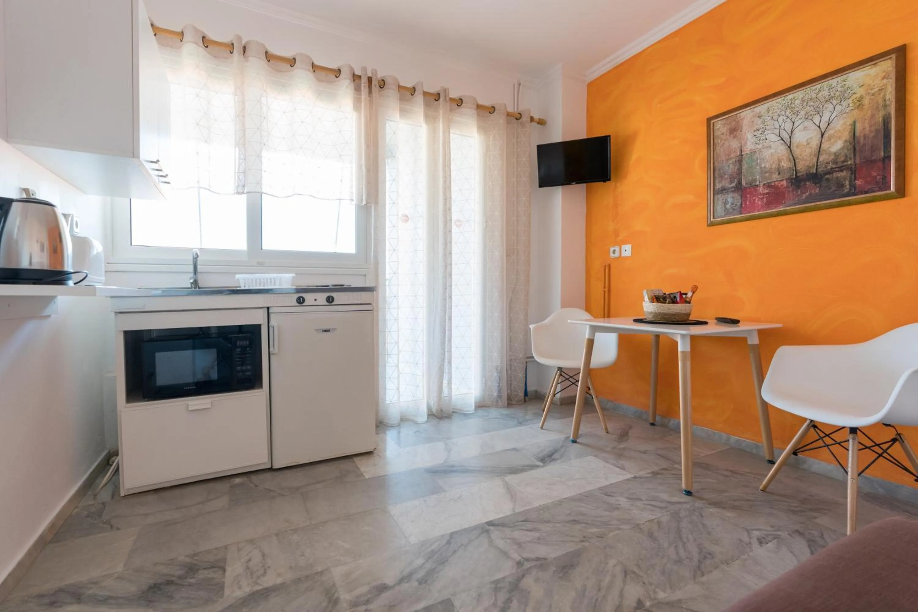 Kitchen or kitchenette in Poseidon Apartments