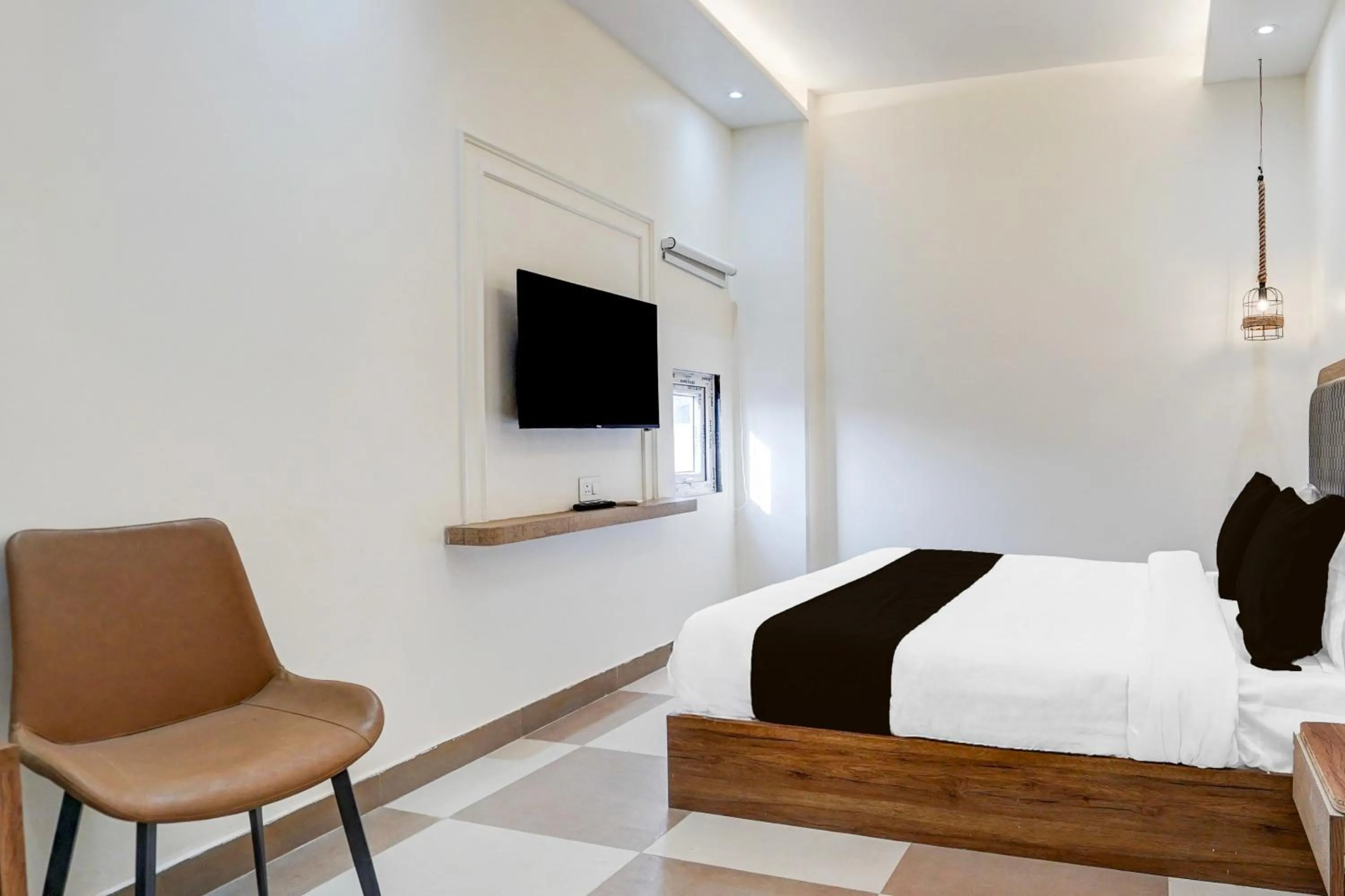 Bedroom in Super Townhouse Lahartara Railway Bridge Near Bus Stop