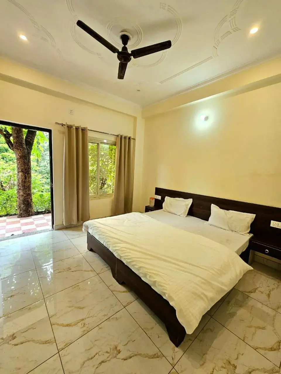 Deluxe Double Room with Extra Bed in Tapovan Cascades Yogvillage Stay Deluxe Double Room with Extra Bed in Tapovan Cascades Yogvillage Stay