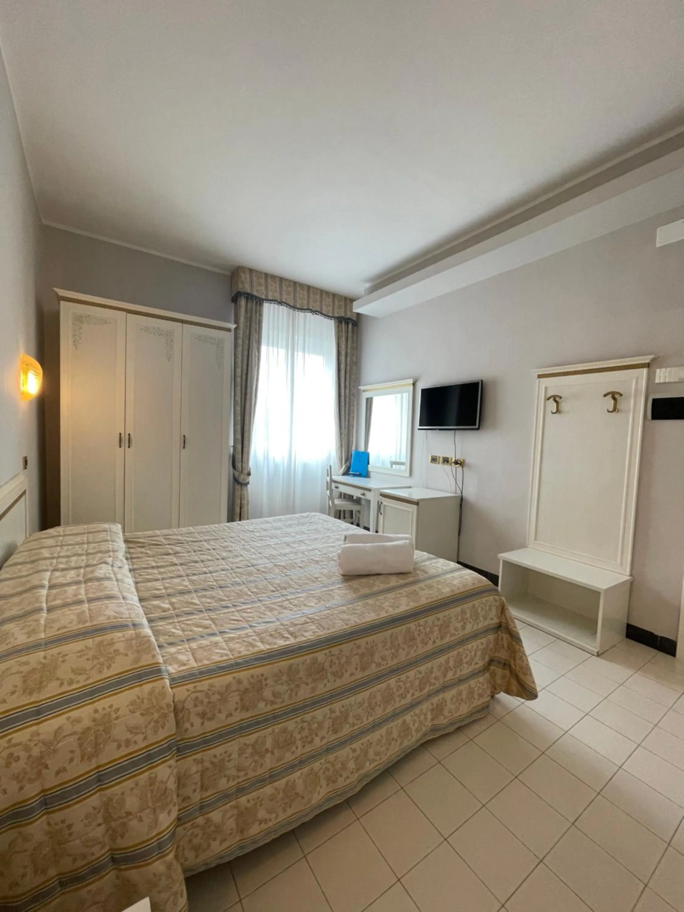 Bed in Platani Hotel