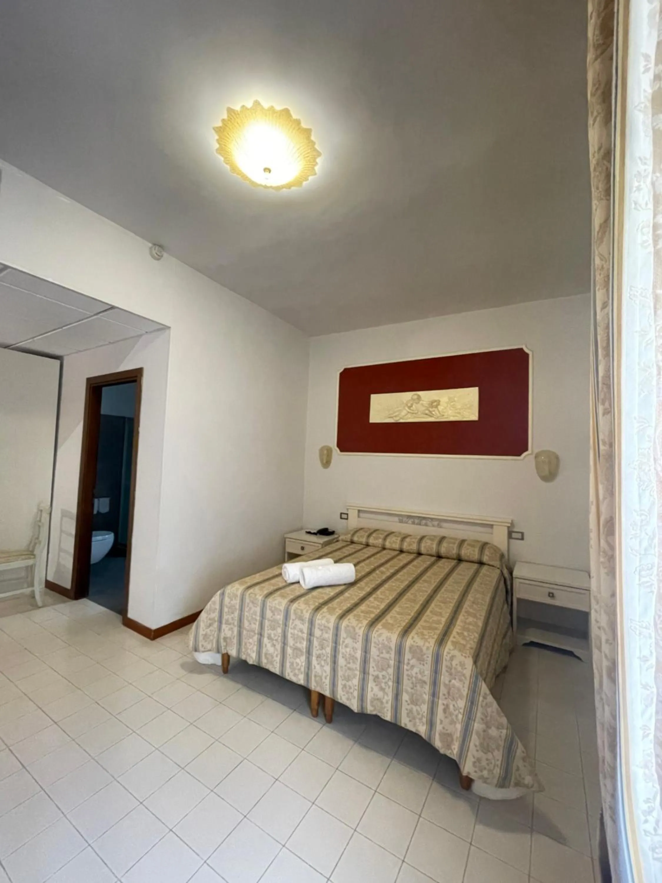 Bed in Platani Hotel