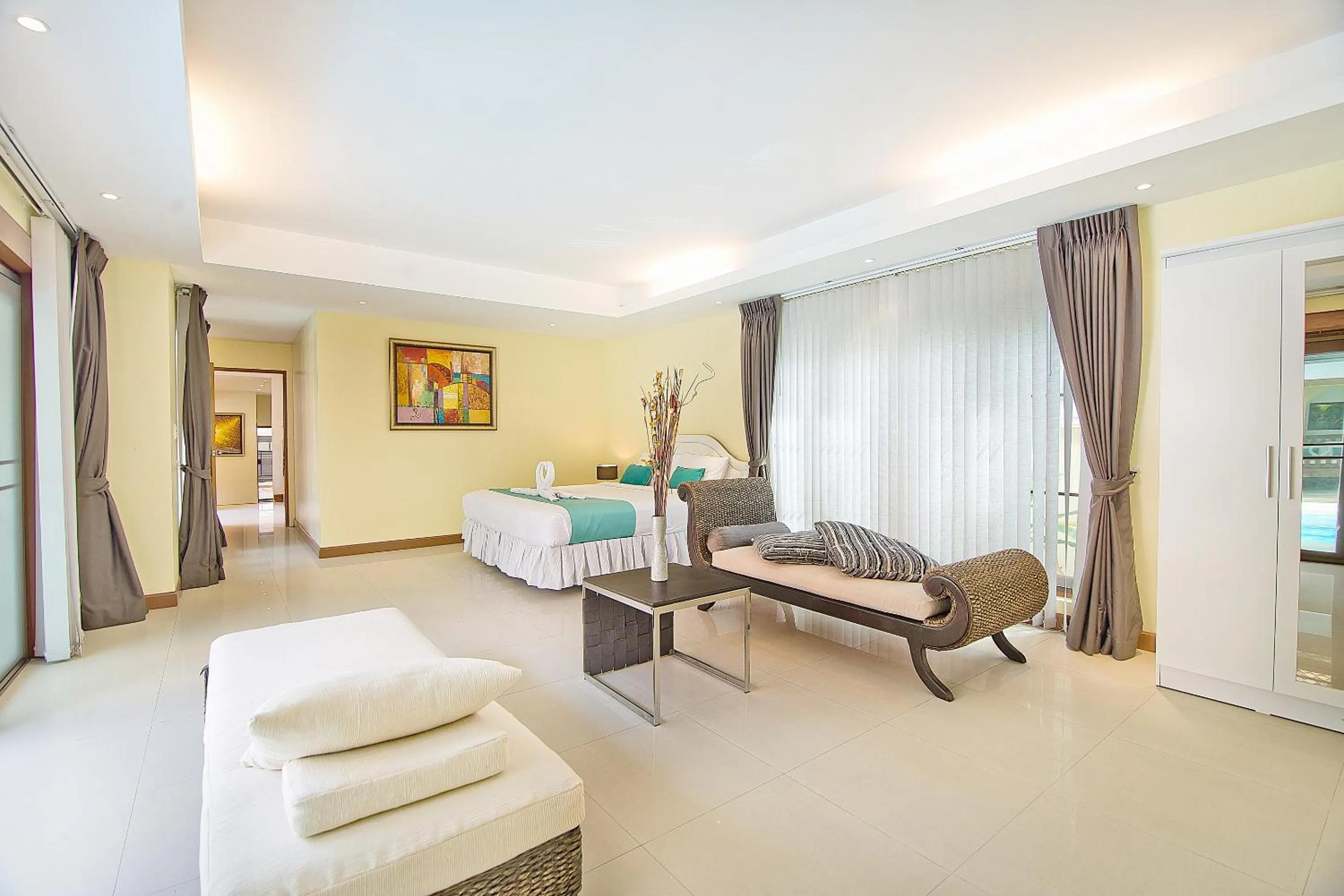 Seating area, Bed in Tropicana Pool Villa