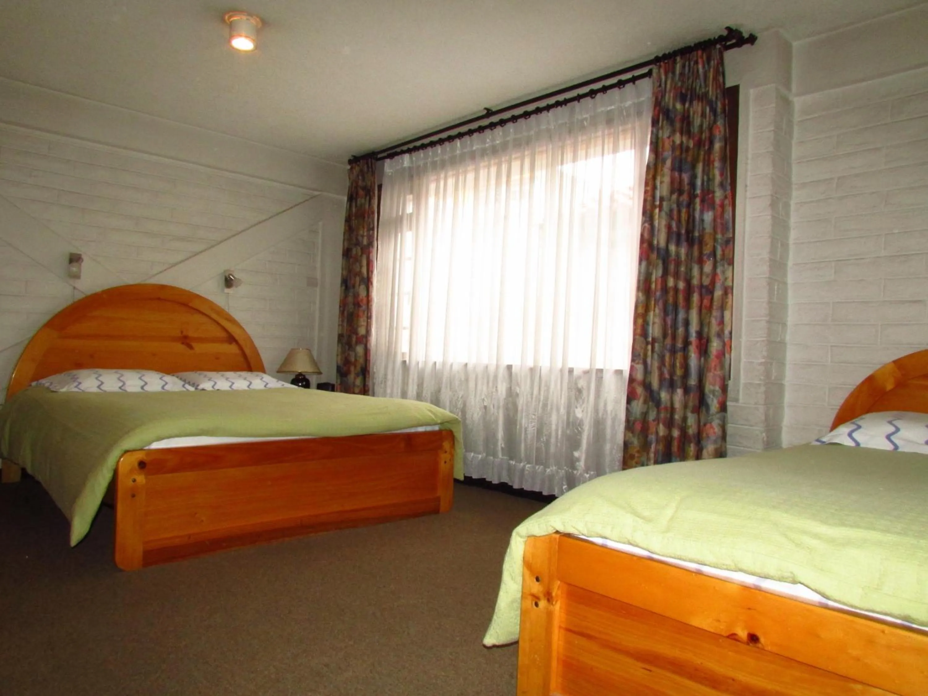 Bed in Apartamentos Los Quipus