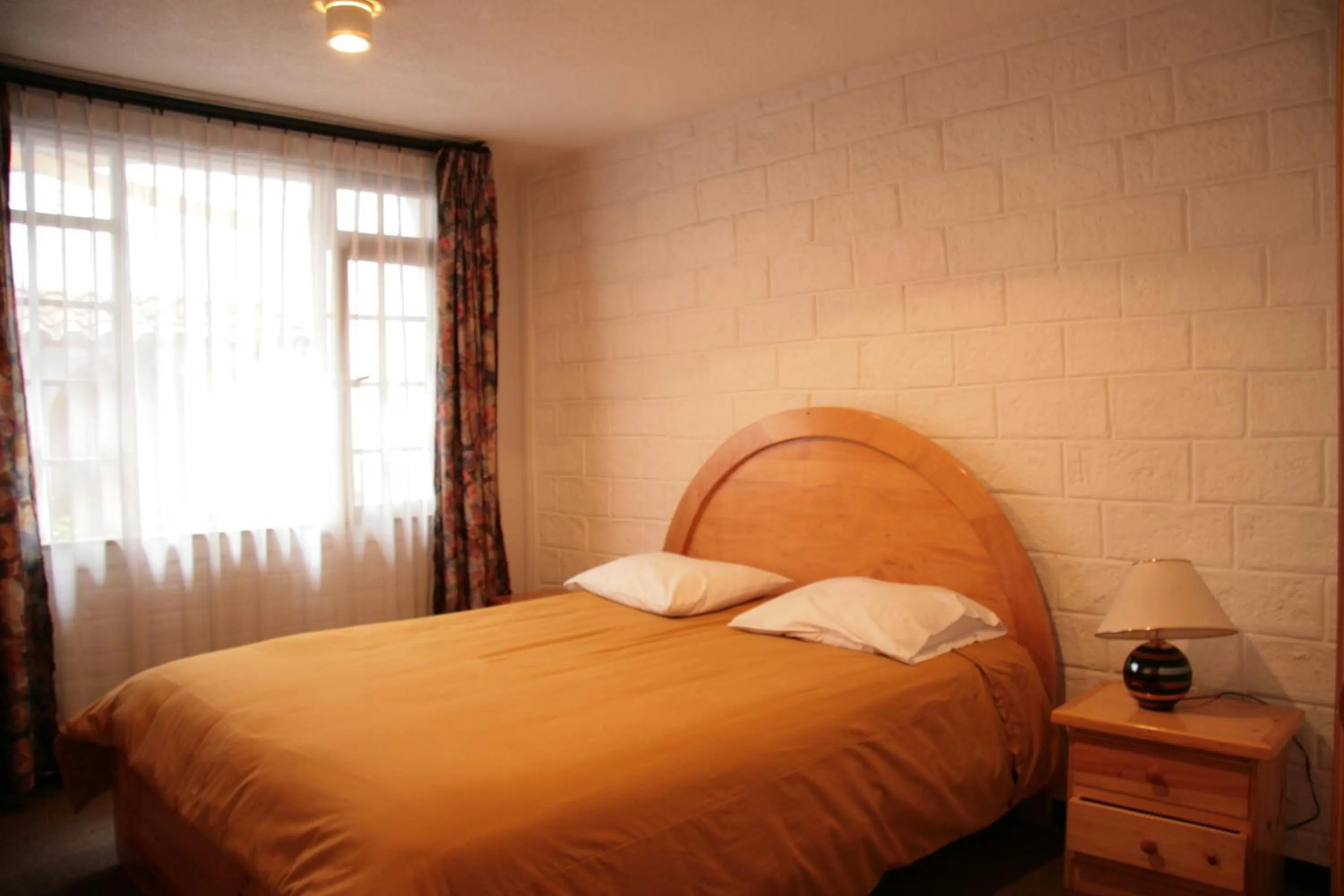 Bed in Apartamentos Los Quipus