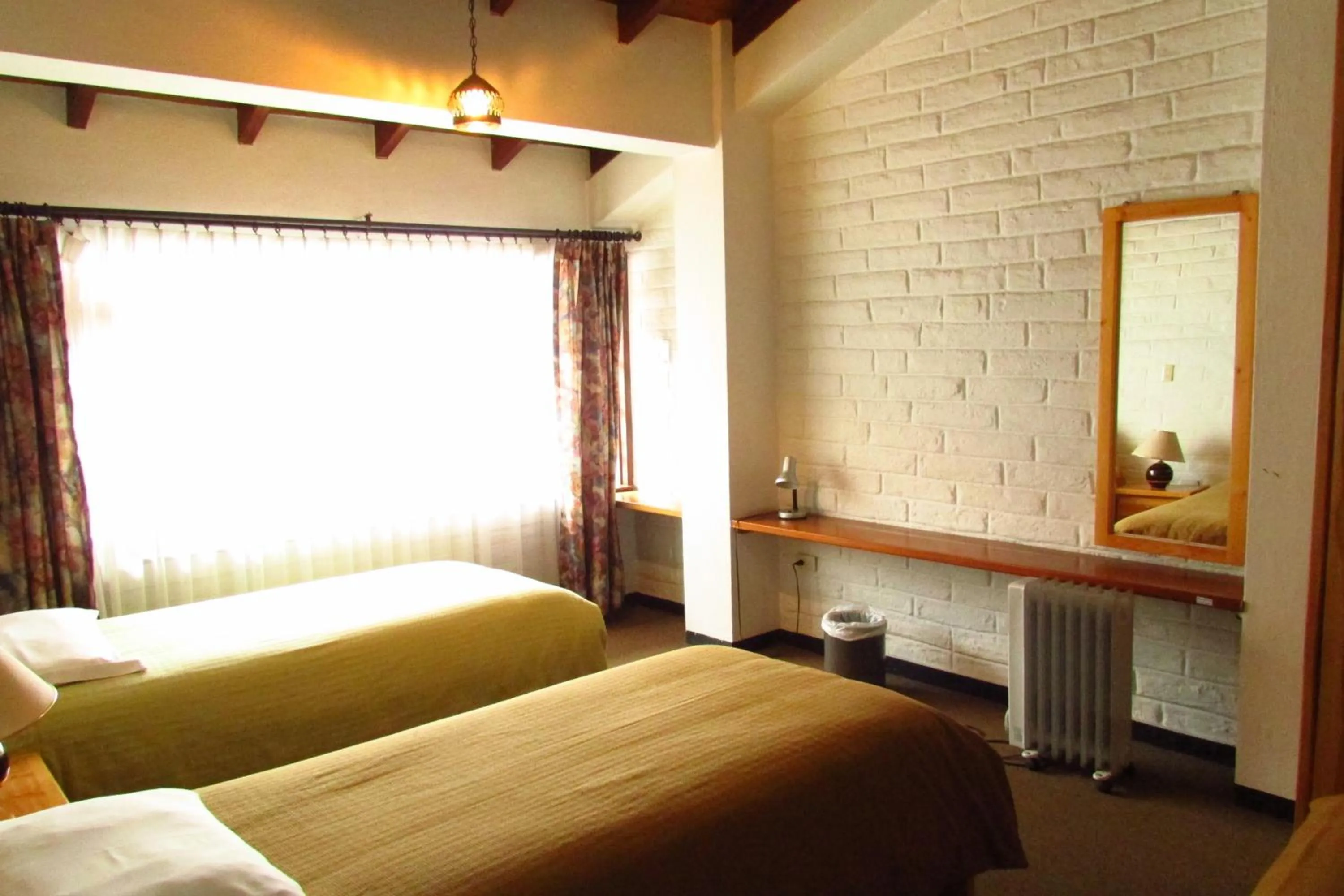 Bed in Apartamentos Los Quipus