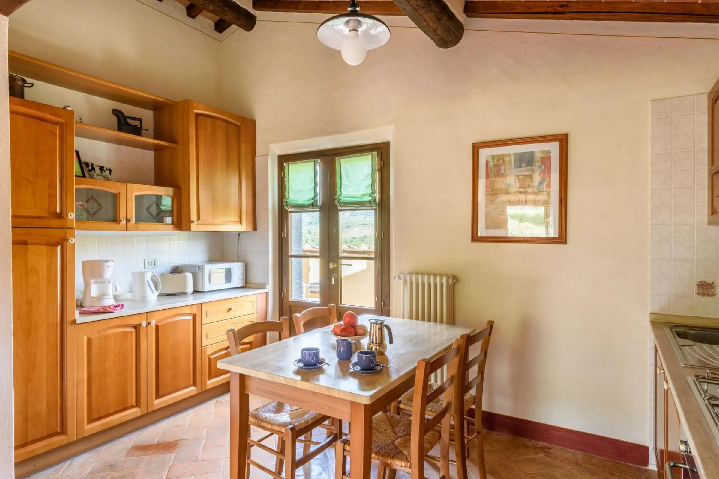 Kitchen or kitchenette in Casa Portagioia