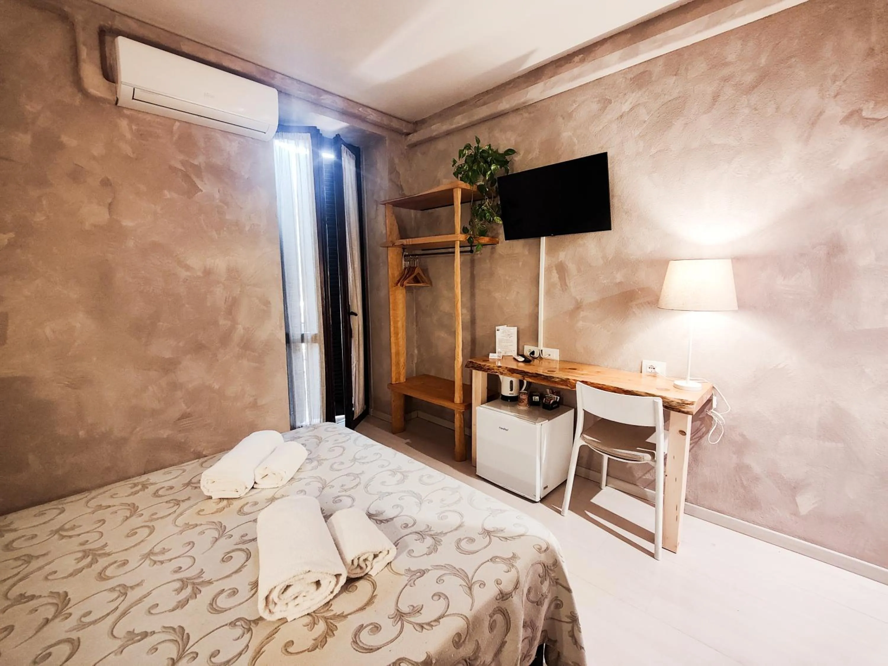 Bed in Albergo B&B Tenesi