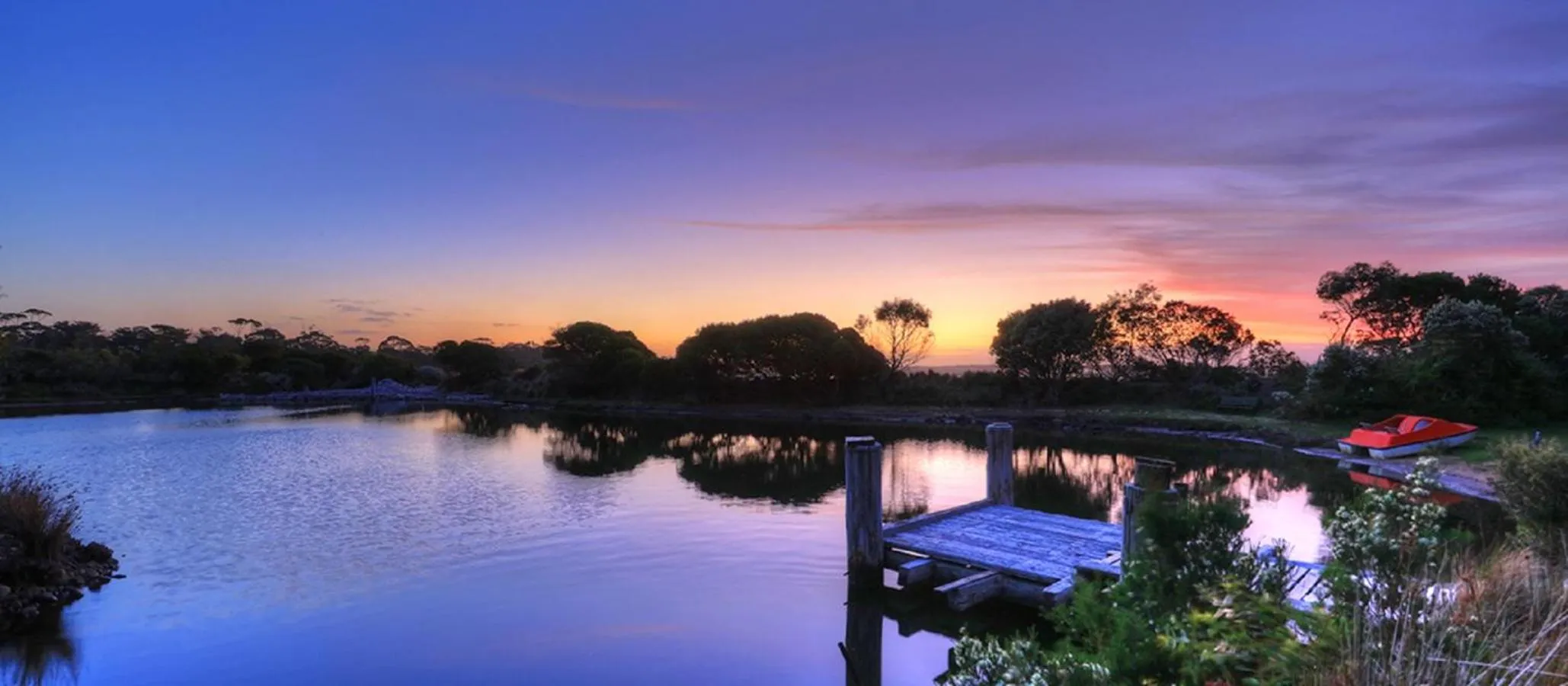 Spring in Stanley Lakeside Spa Cabins