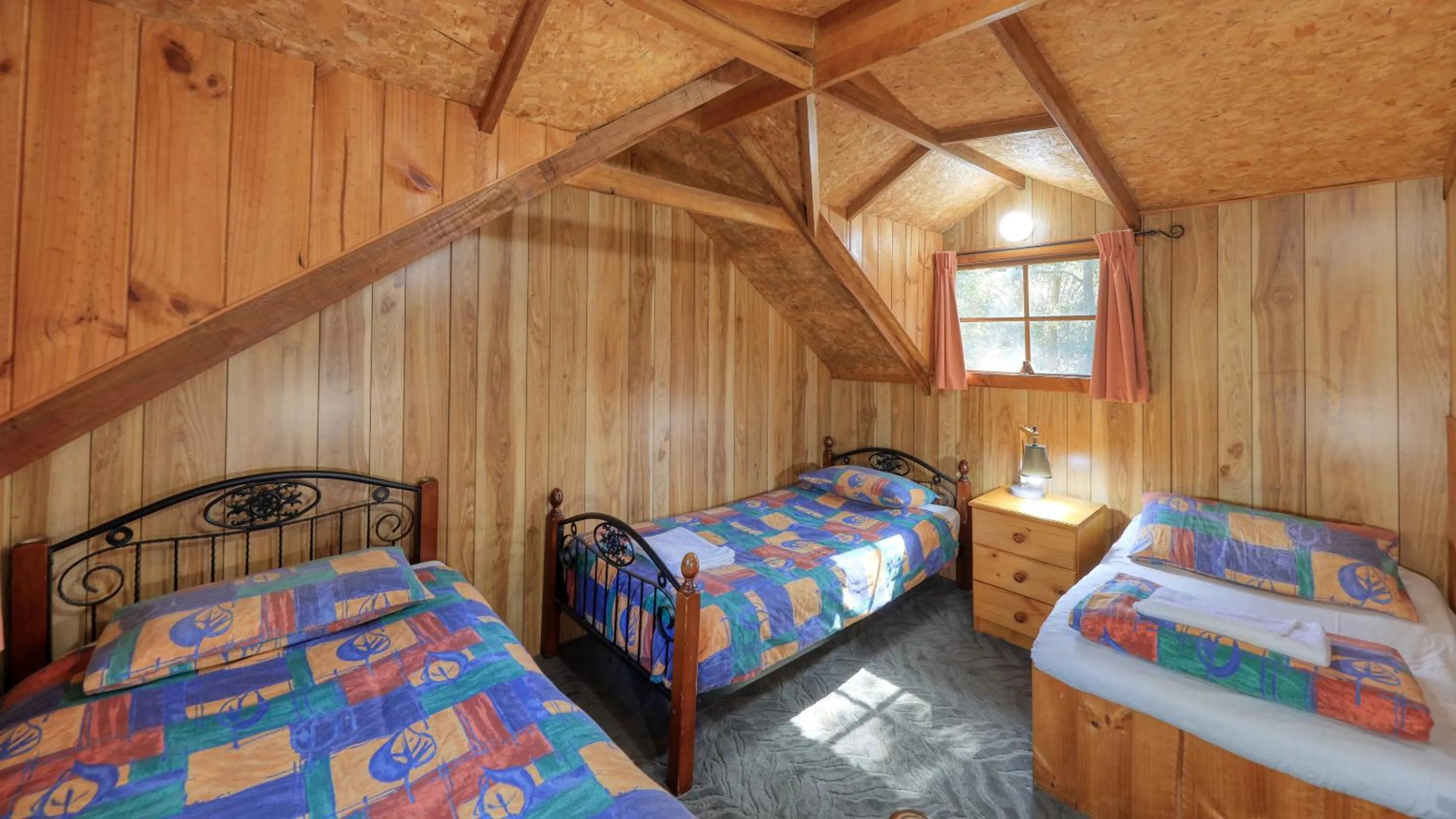 Bed in Crayfish Creek Van & Cabin Park