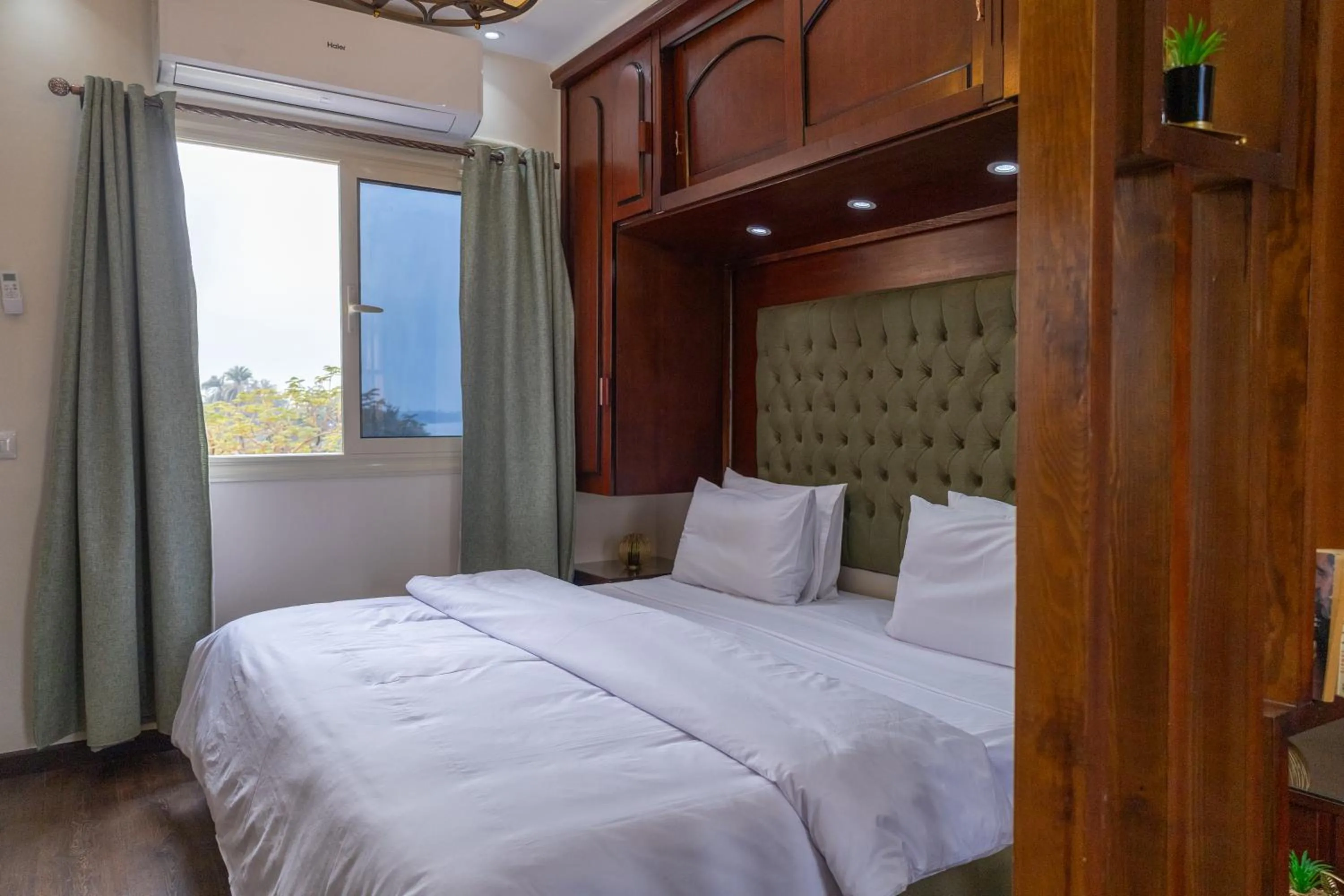 Bed in Aton Suites Luxor Resort East Bank Nile View