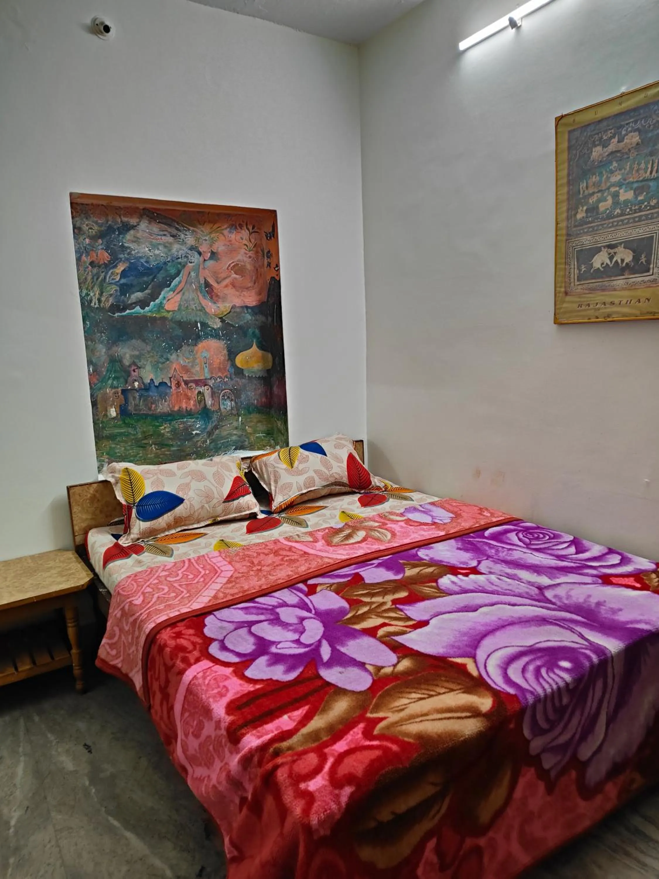 Bed in Priya guest house pushkar