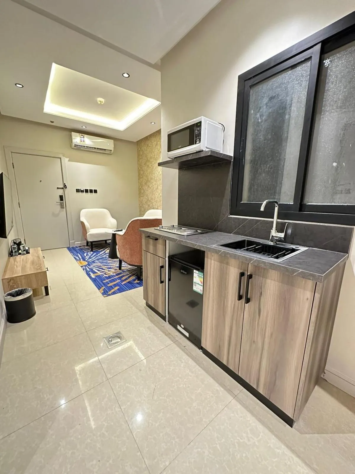 Kitchen or kitchenette in XYZ Hotel Qurtoba - اكس واي زد قرطبه