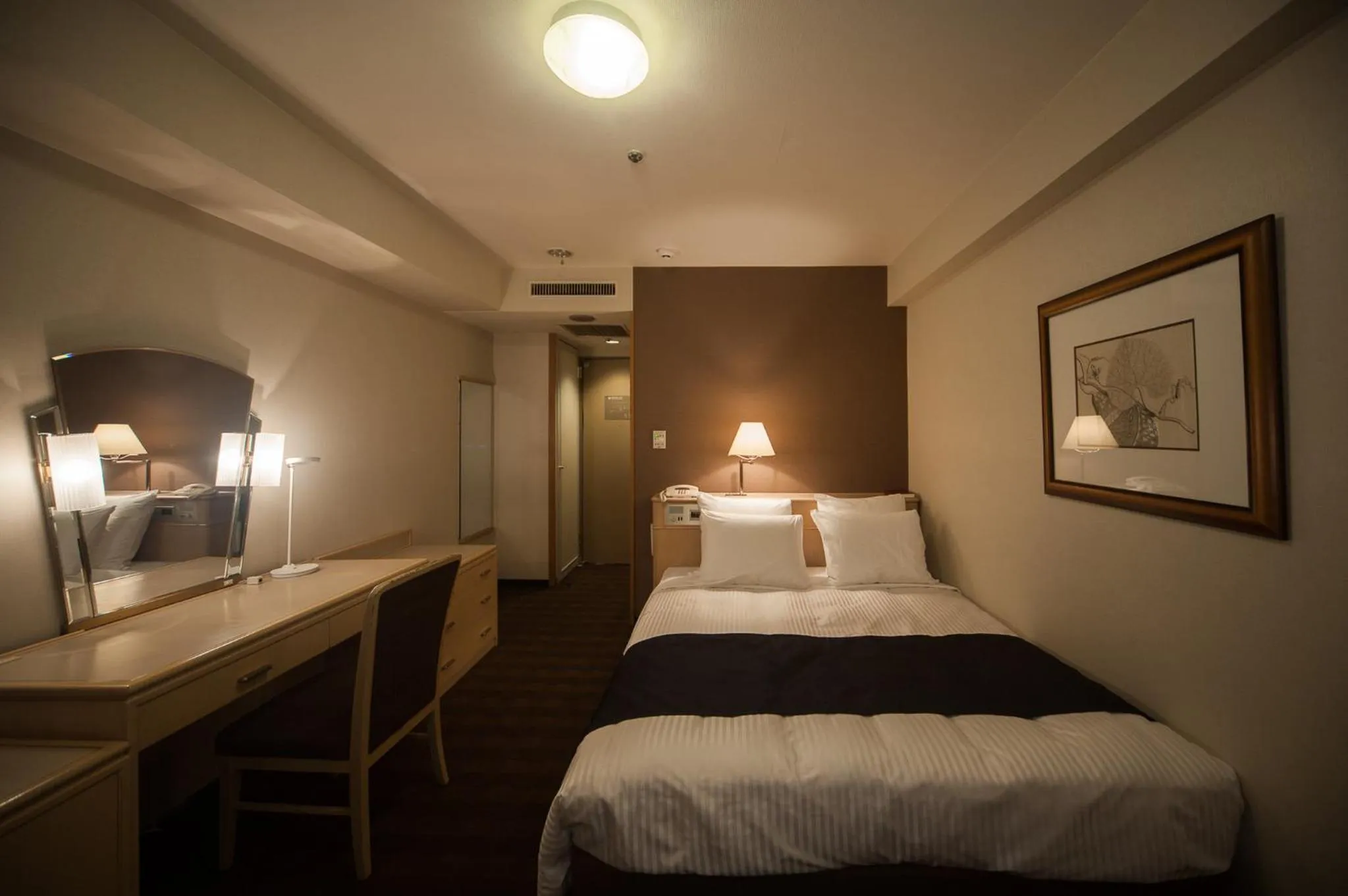 Photo of the whole room, Bed in ANA Crowne Plaza Matsuyama by IHG