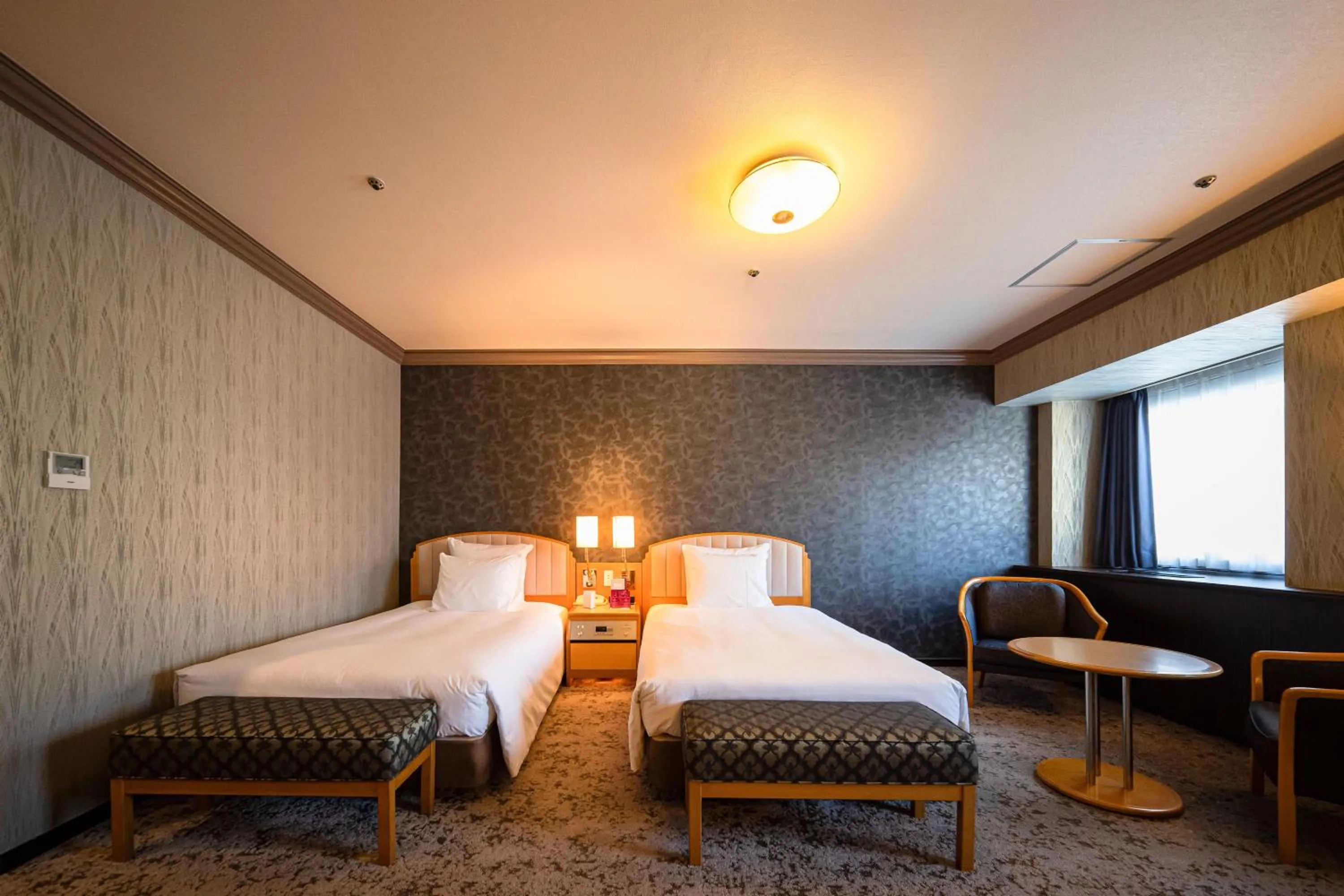 Photo of the whole room, Bed in ANA Crowne Plaza Matsuyama by IHG
