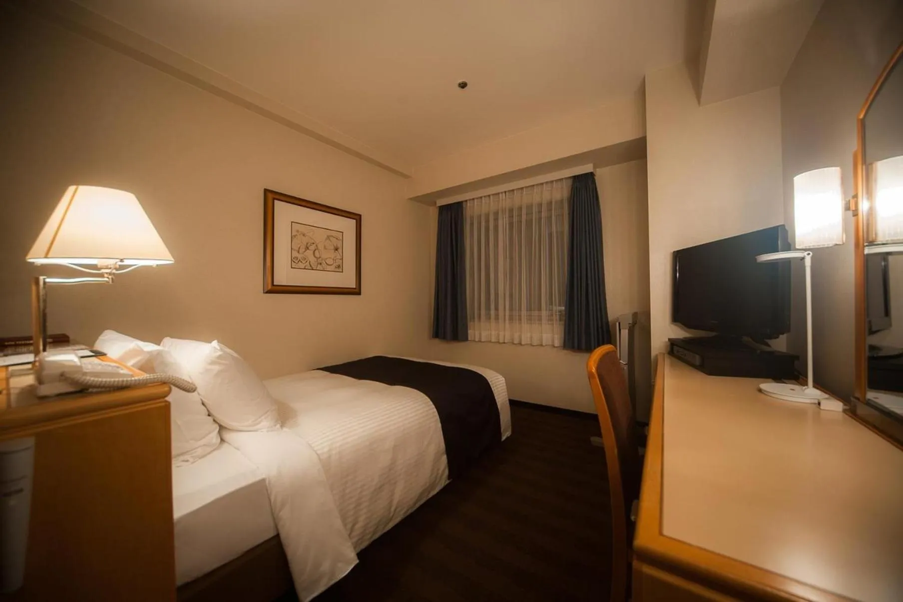 Photo of the whole room, Bed in ANA Crowne Plaza Matsuyama by IHG