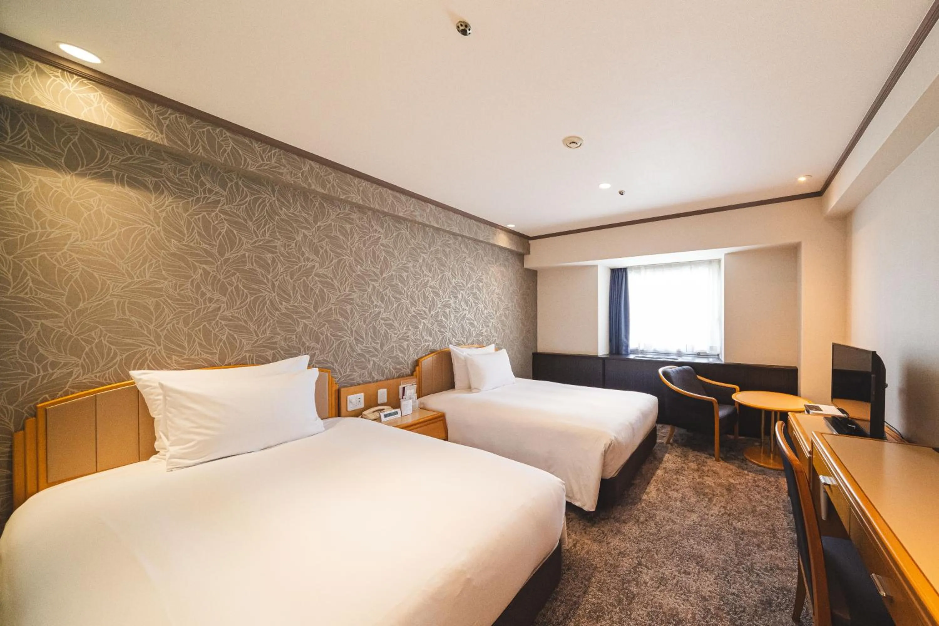 Photo of the whole room, Bed in ANA Crowne Plaza Matsuyama by IHG