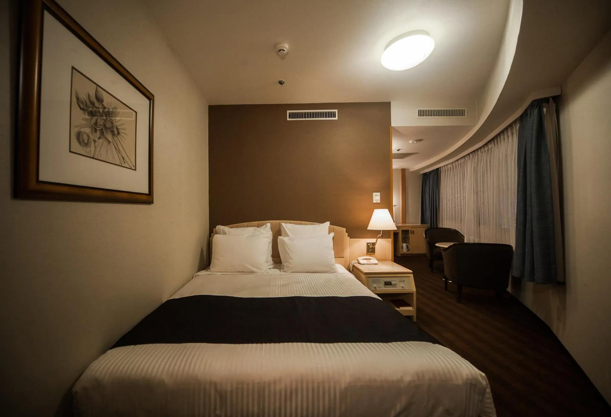 Photo of the whole room, Bed in ANA Crowne Plaza Matsuyama by IHG