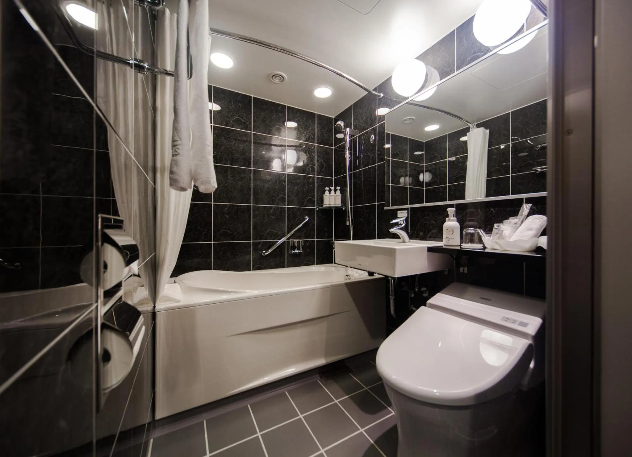 Bathroom in ANA Crowne Plaza Matsuyama by IHG