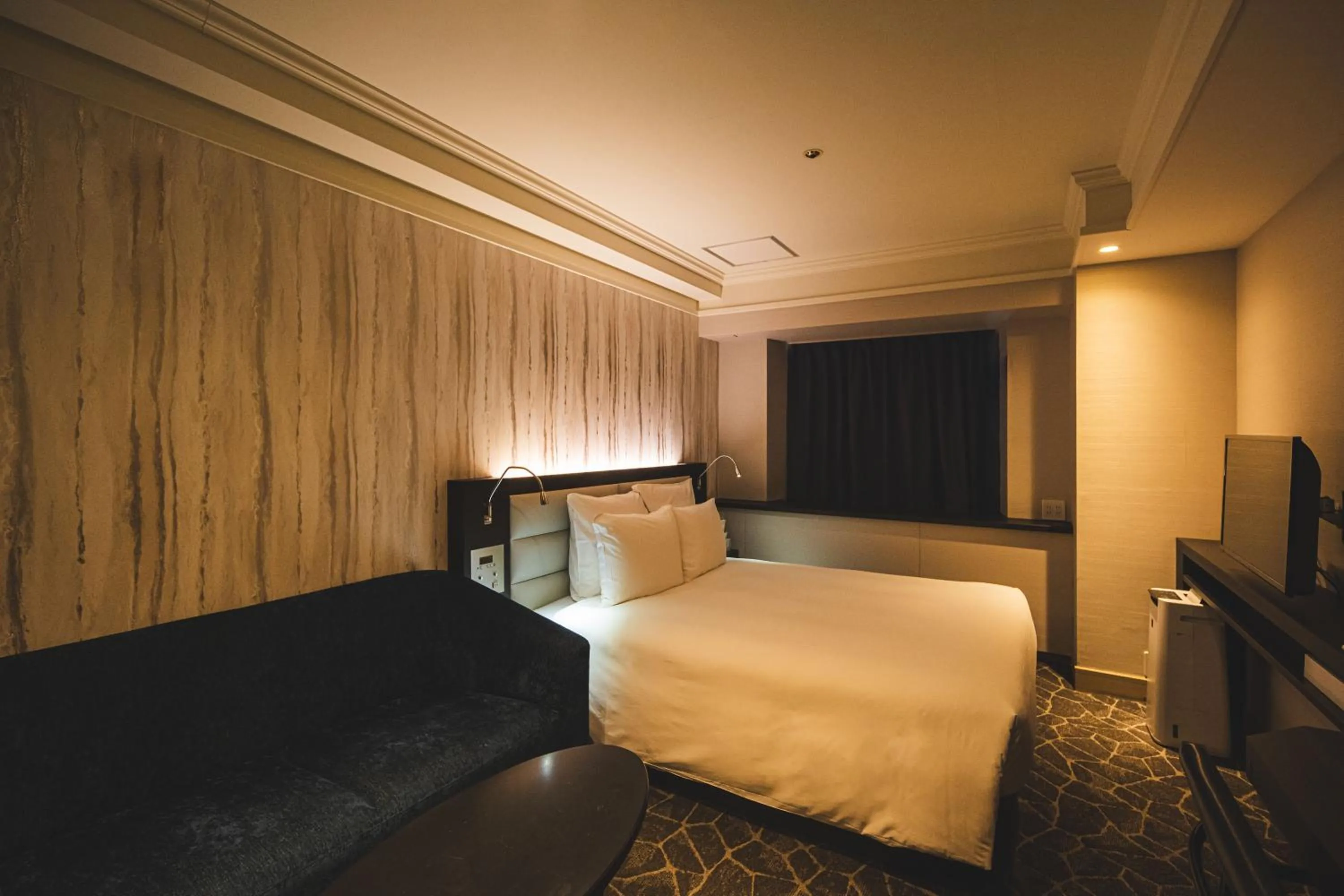 Photo of the whole room, Bed in ANA Crowne Plaza Matsuyama by IHG