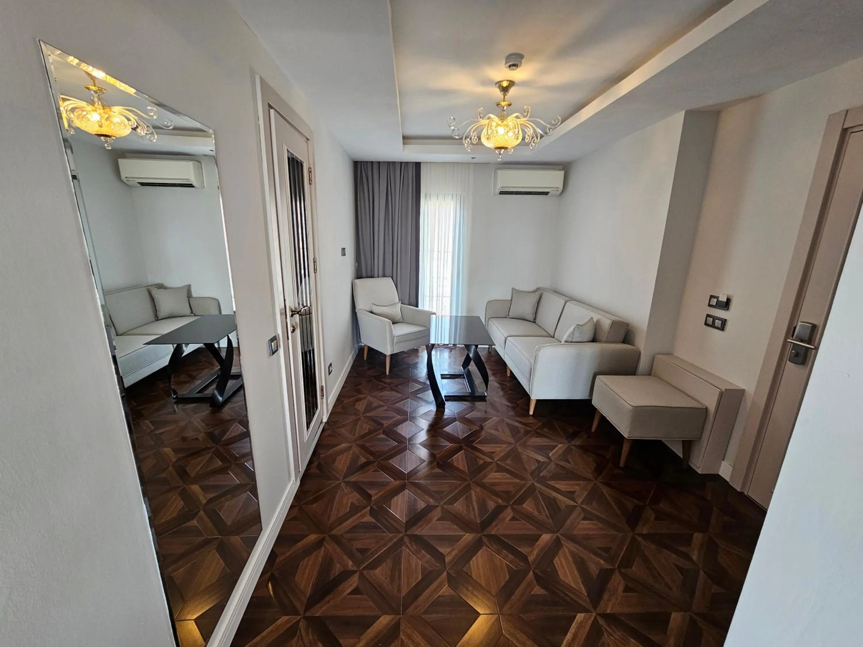 Seating area, Bed in Anthemis Hotel