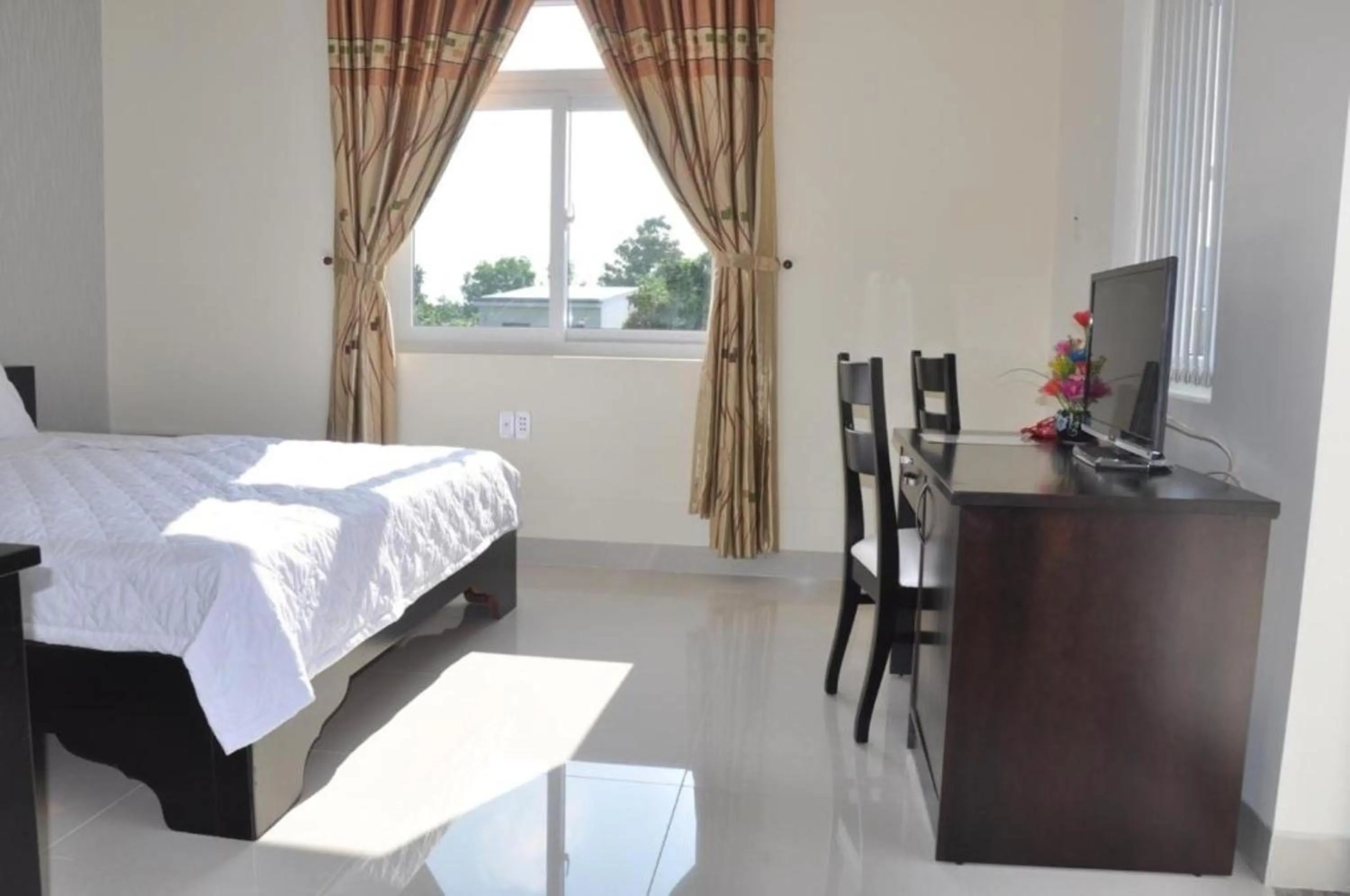 Photo of the whole room, Bed in Tan Duy Hotel