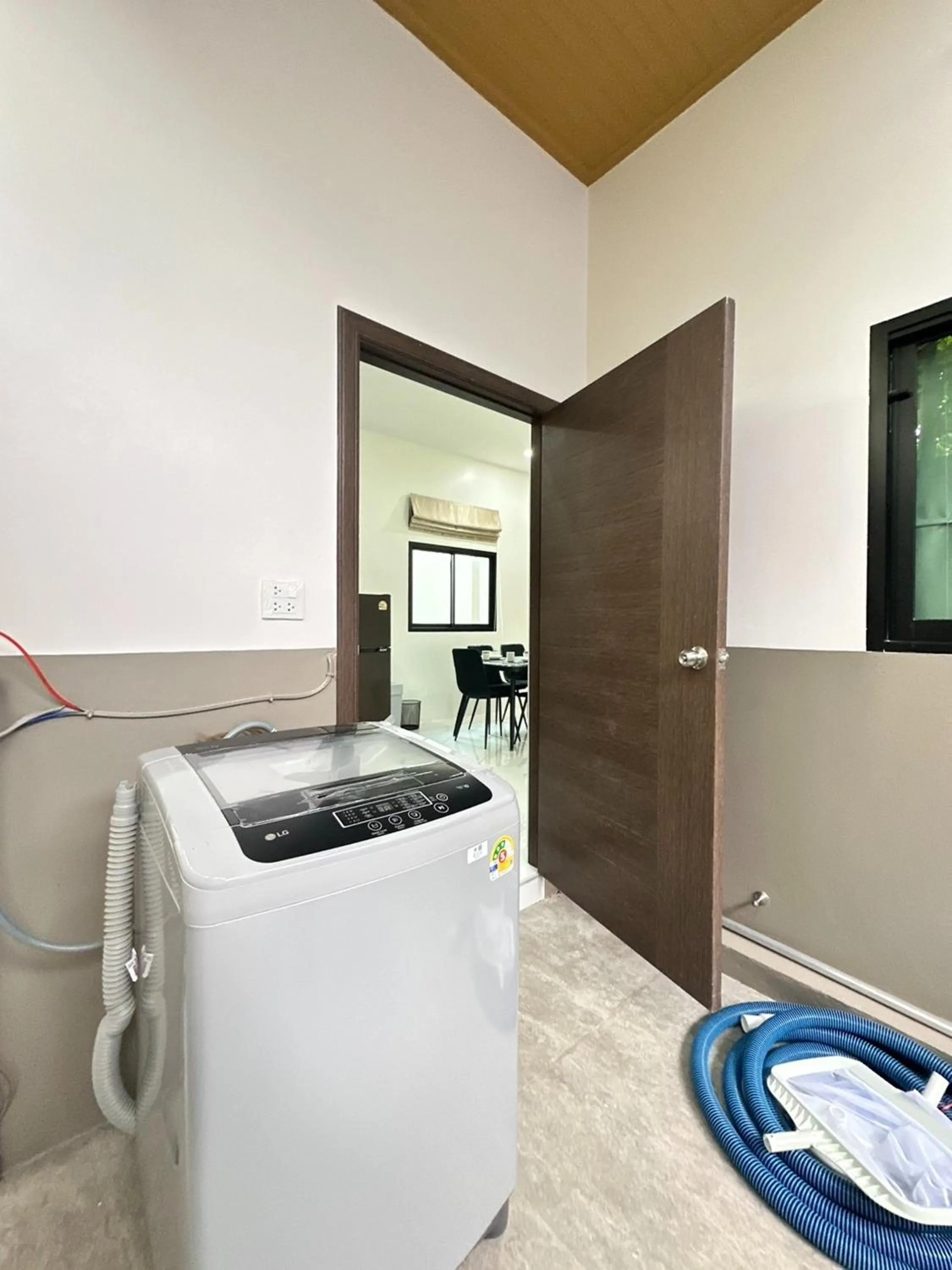 washing machine in Golden Palm Resort