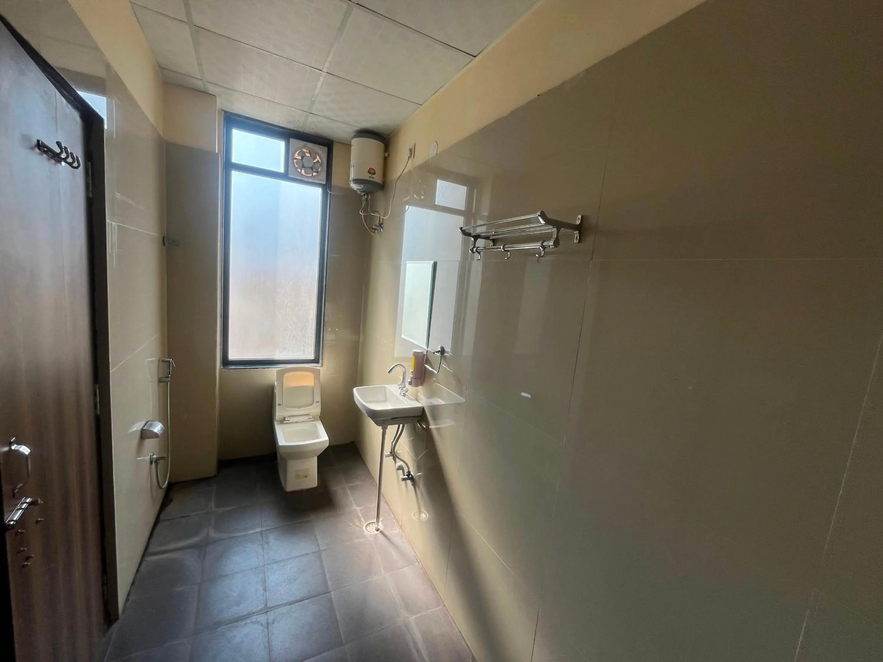 Bathroom in Hotel O Golden Manor Inn